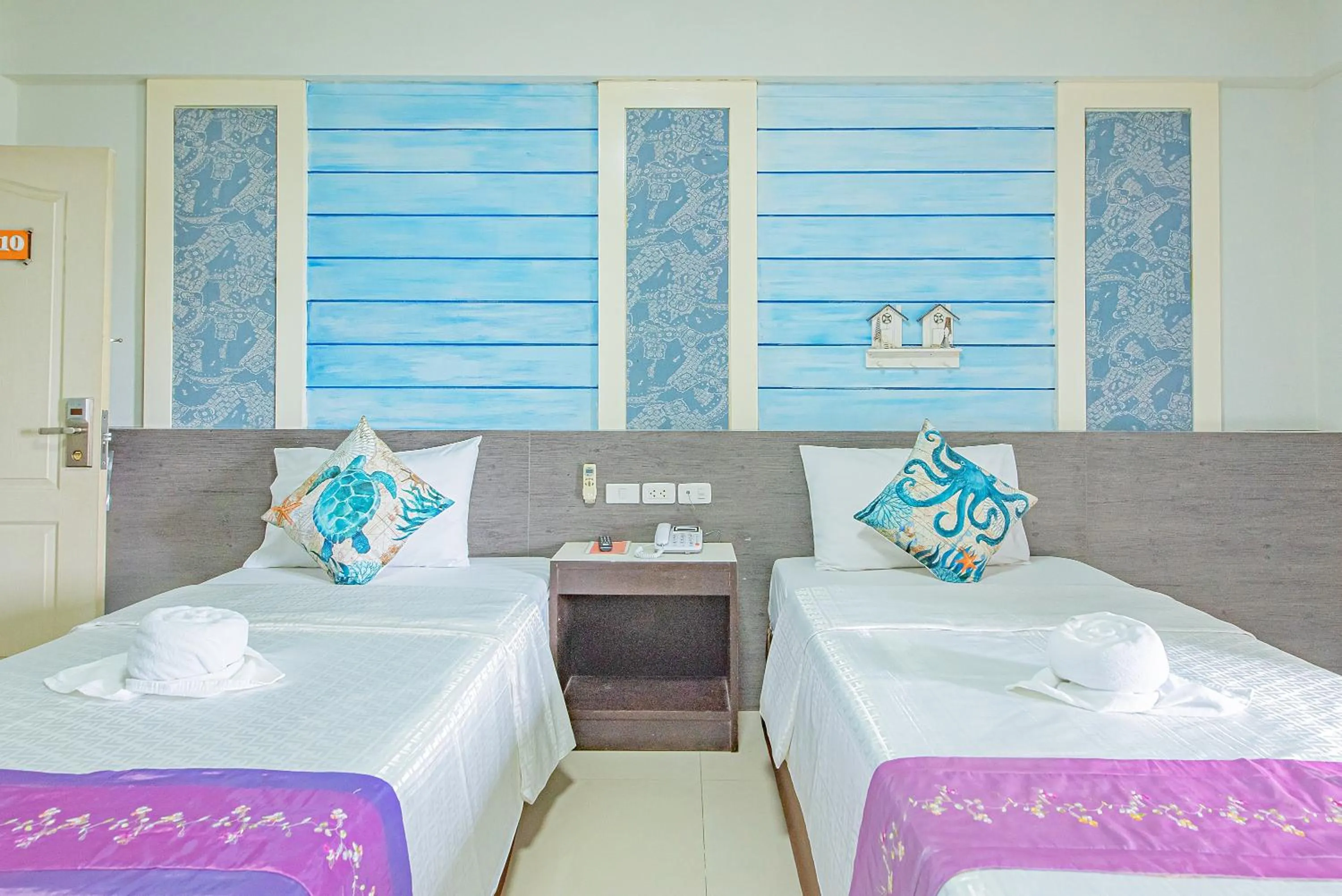 Bed in The Wing Design Hotel