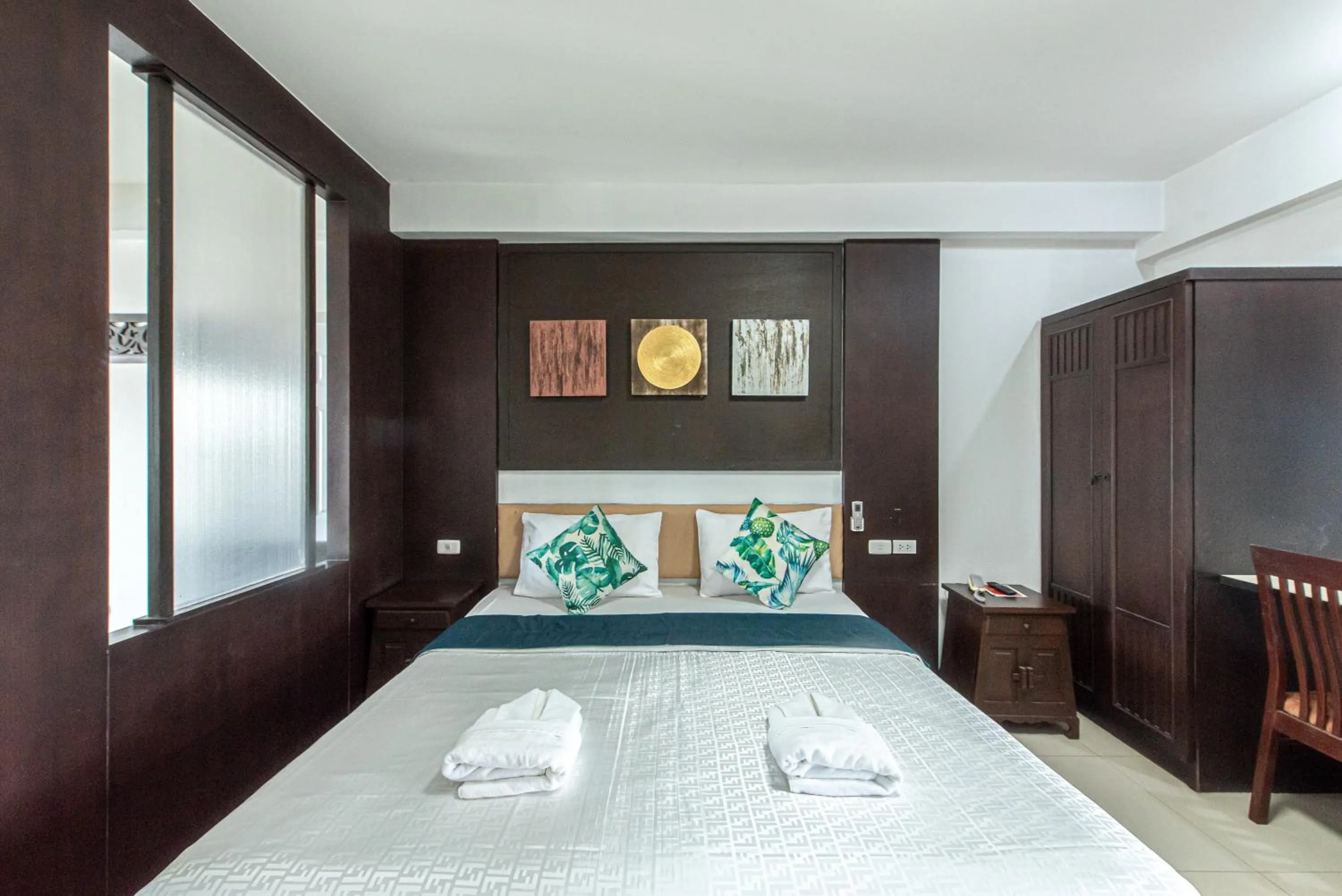 Bed in The Wing Design Hotel