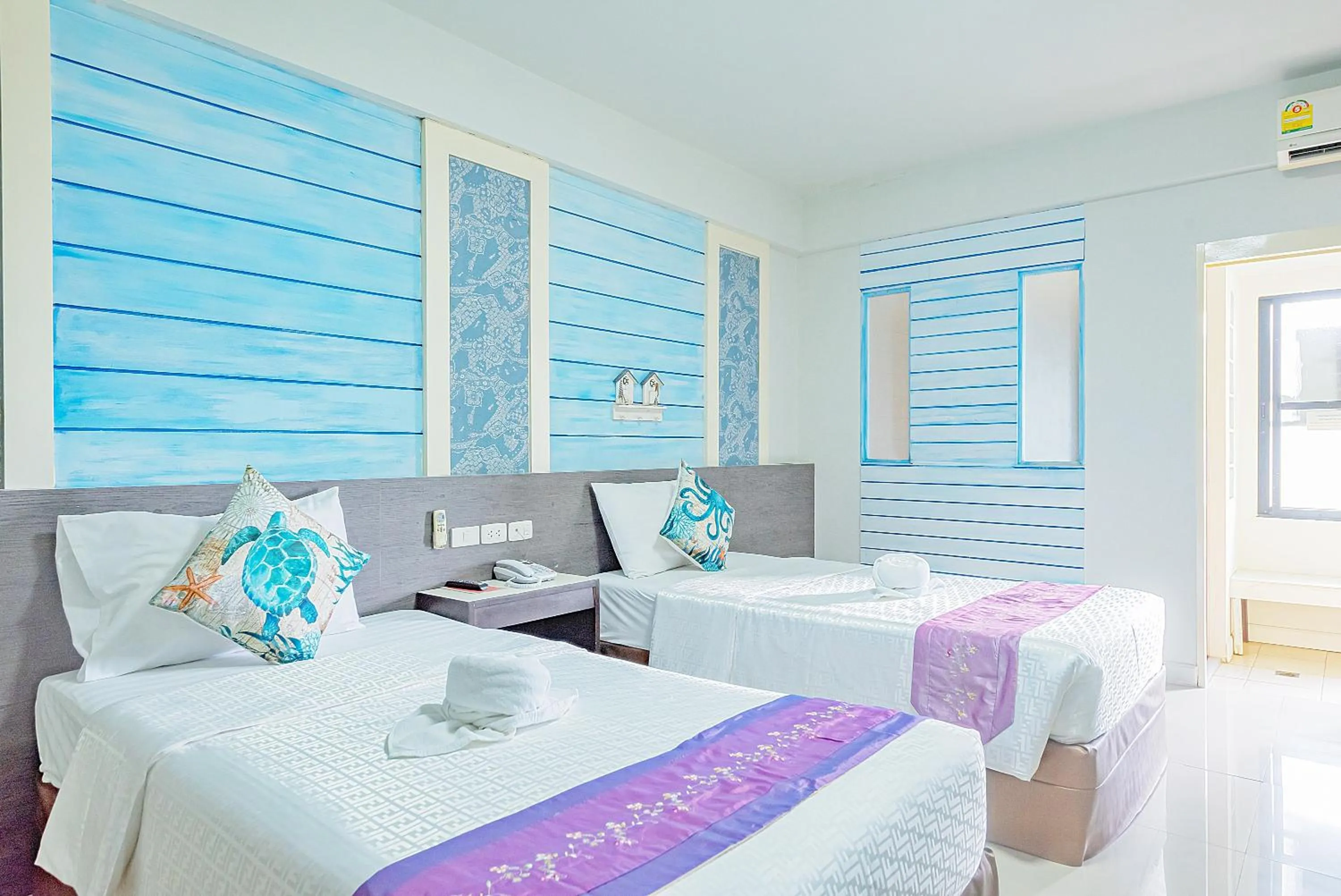 Bed in The Wing Design Hotel