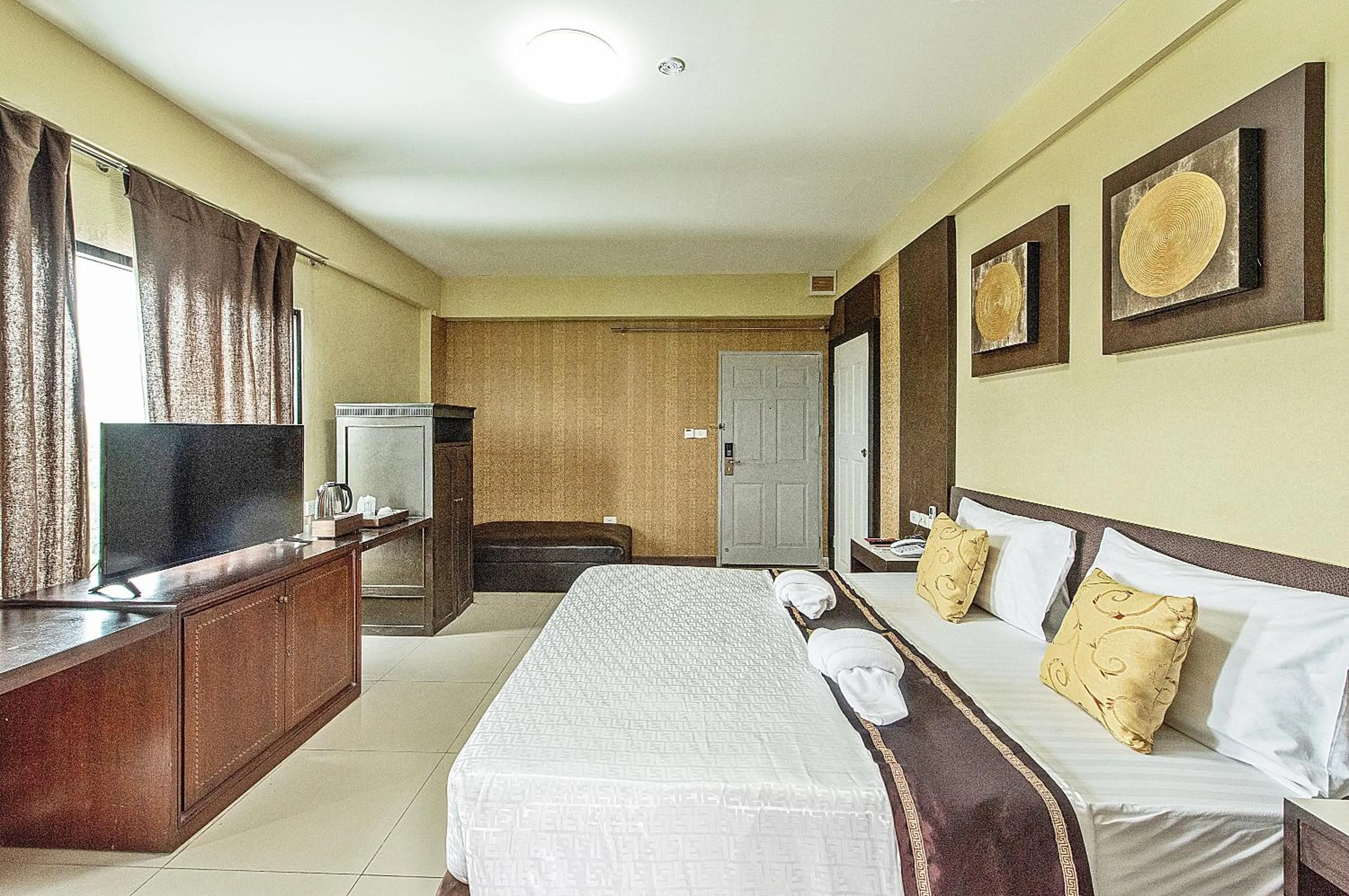 Bed in The Wing Design Hotel