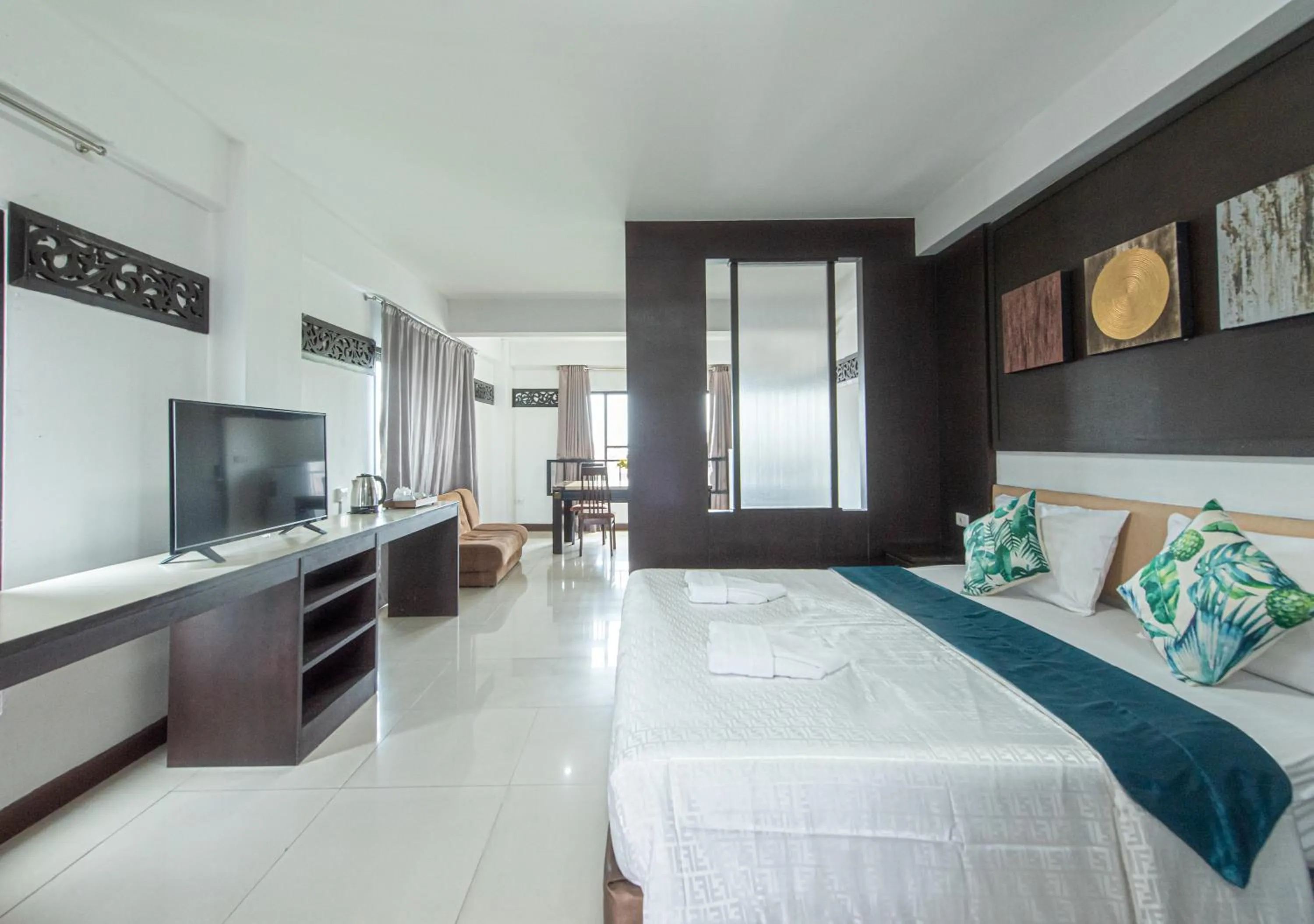 Bed in The Wing Design Hotel