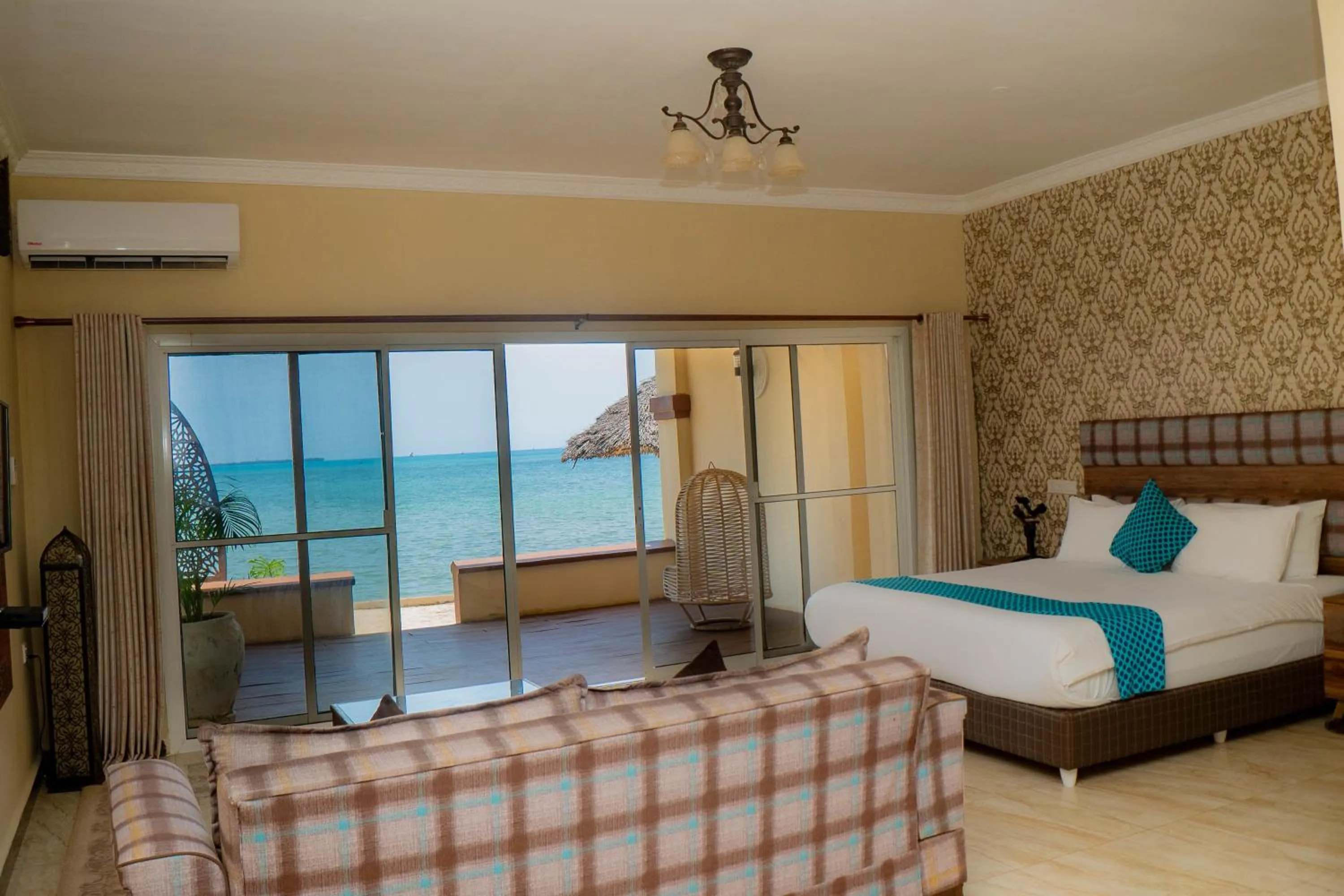 Seating area, Bed in Golden Palm Boutique Zanzibar