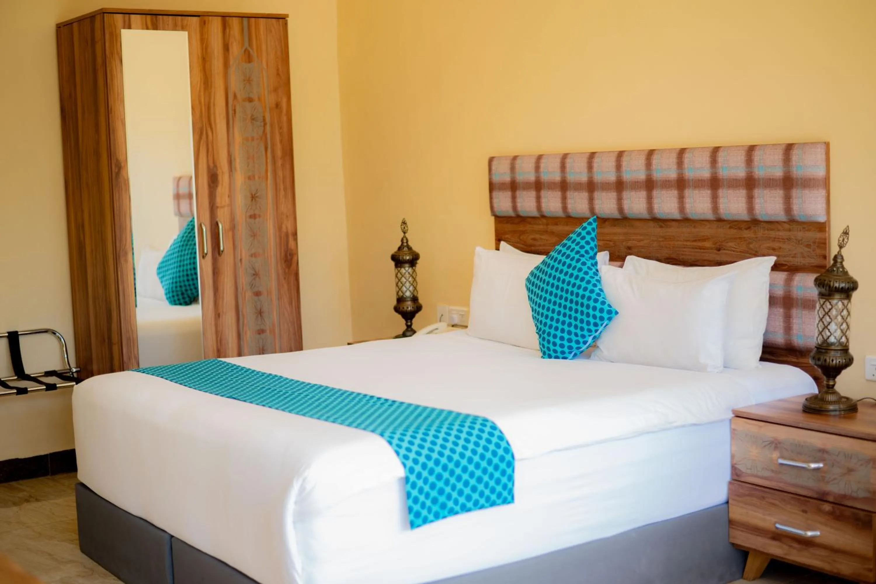 Bed in Golden Palm Boutique Zanzibar