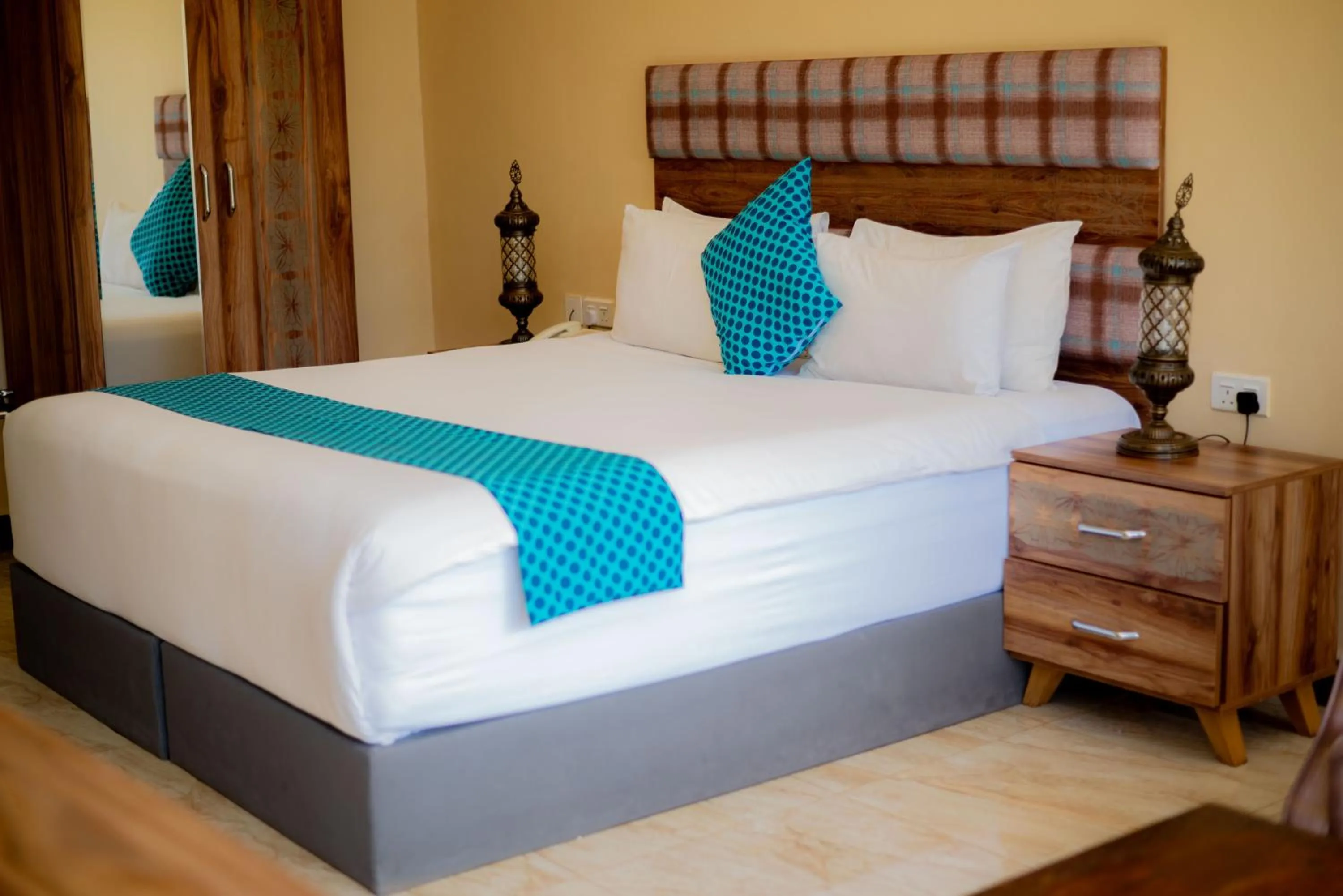 Bed in Golden Palm Boutique Zanzibar