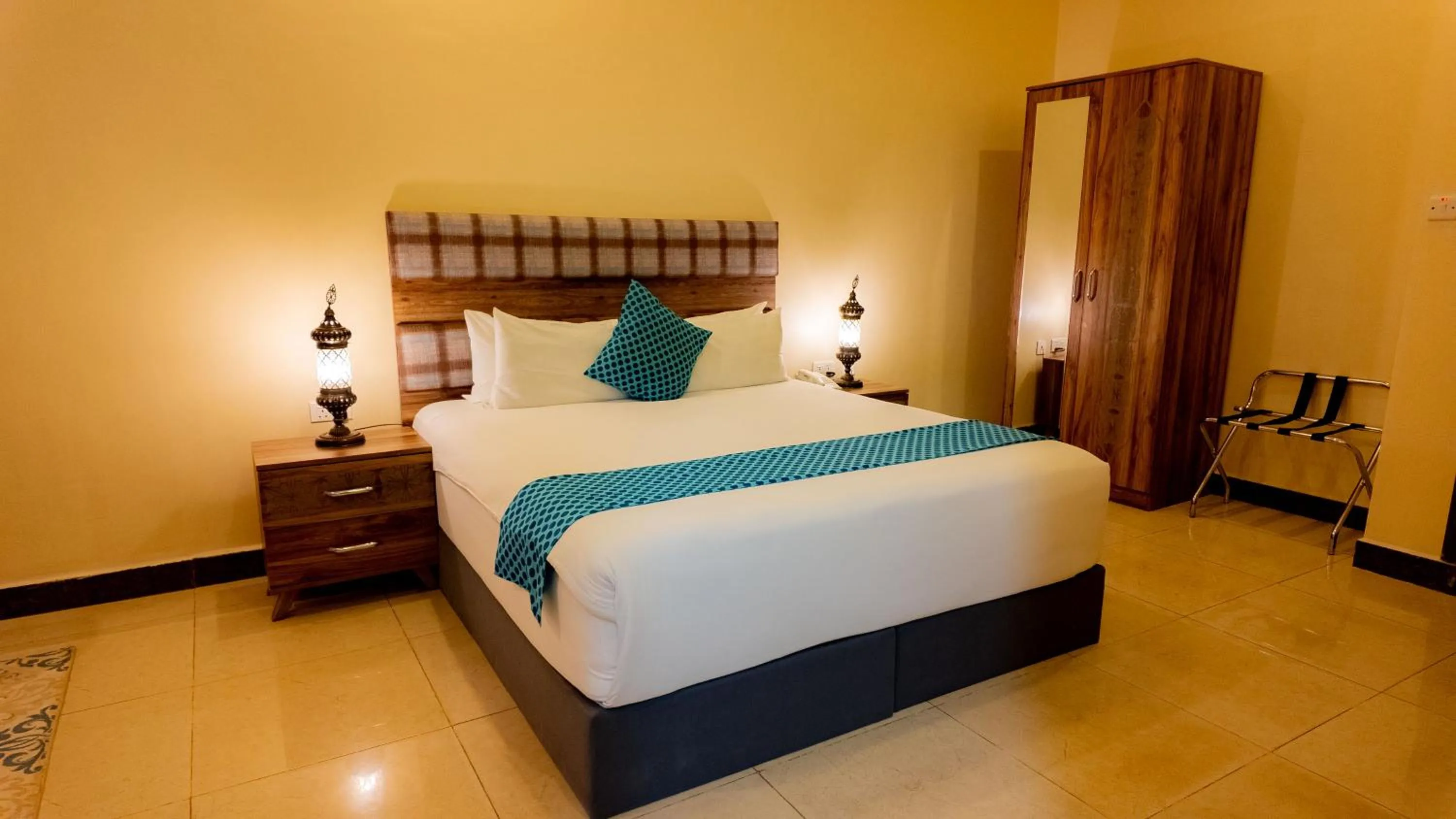 Bed in Golden Palm Boutique Zanzibar