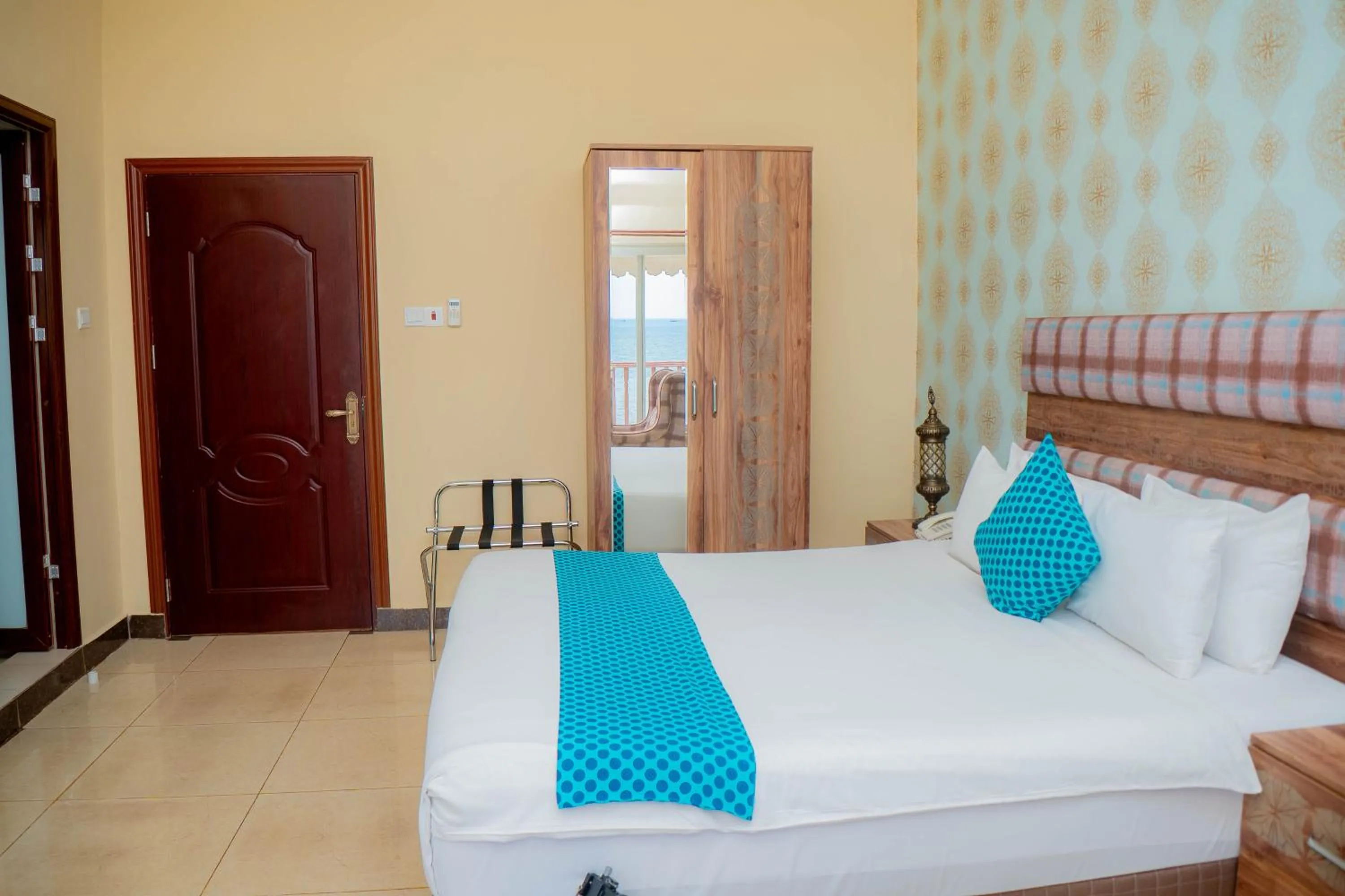 Bed in Golden Palm Boutique Zanzibar