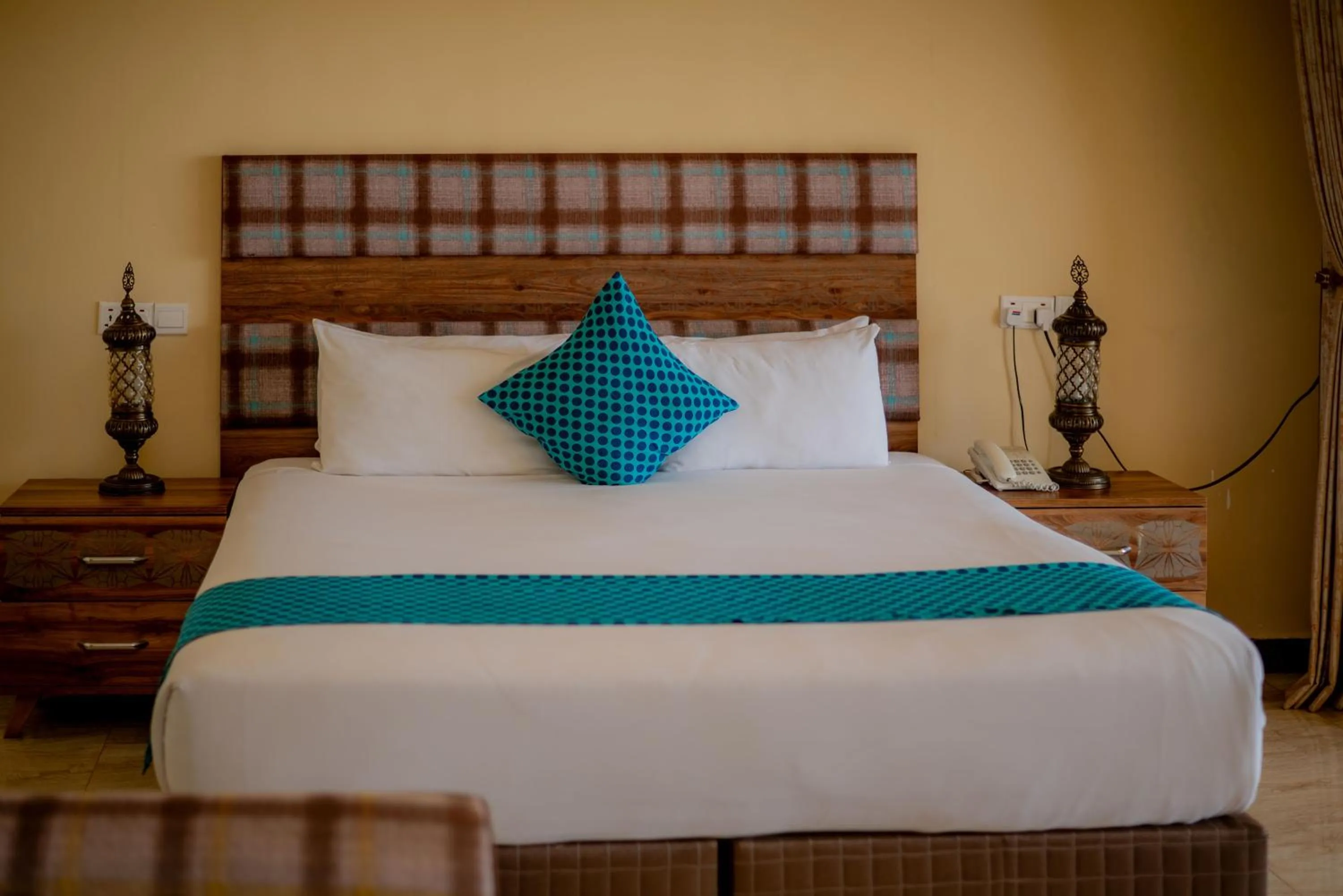 Bed in Golden Palm Boutique Zanzibar