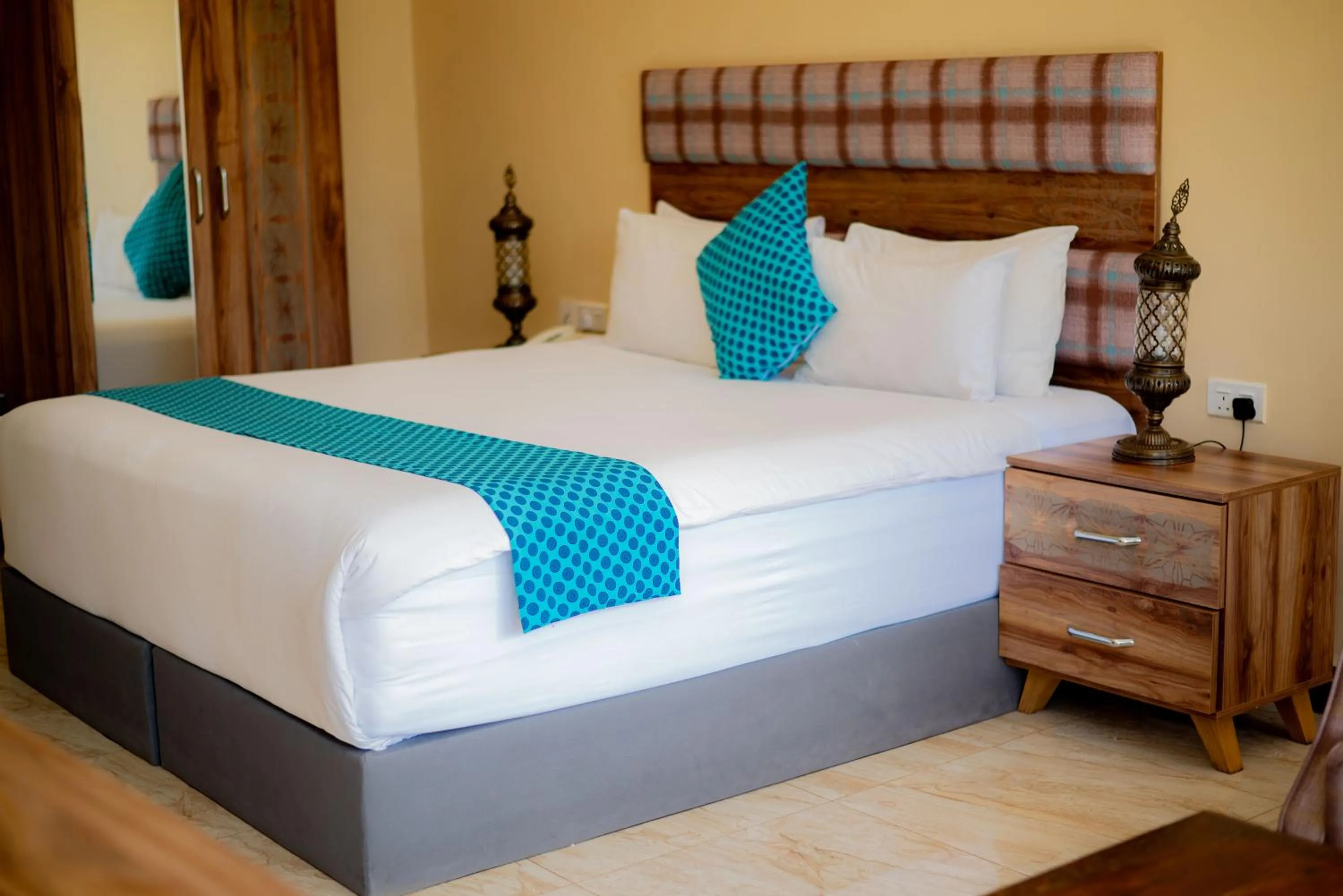 Bed in Golden Palm Boutique Zanzibar
