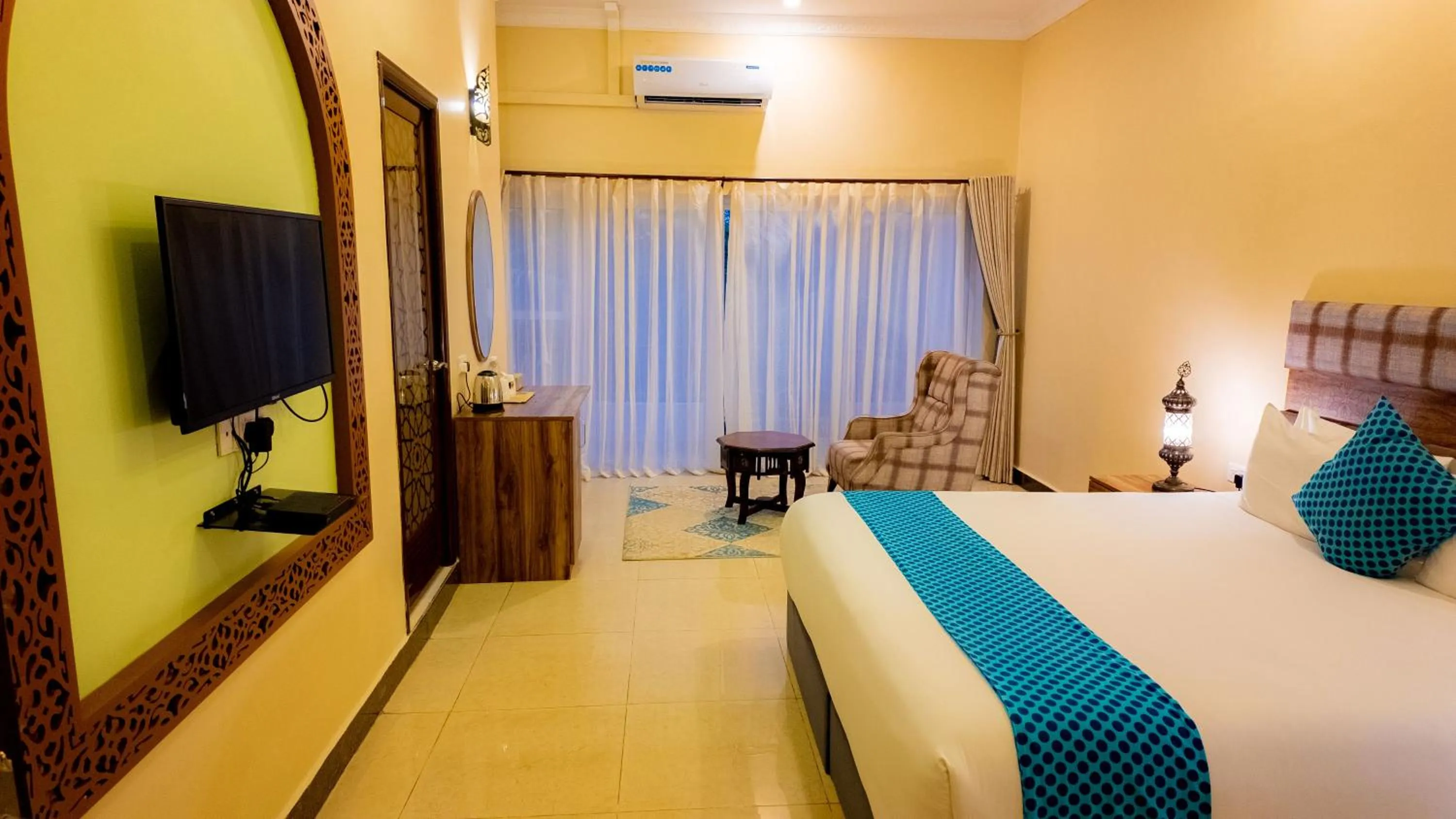 Bed in Golden Palm Boutique Zanzibar