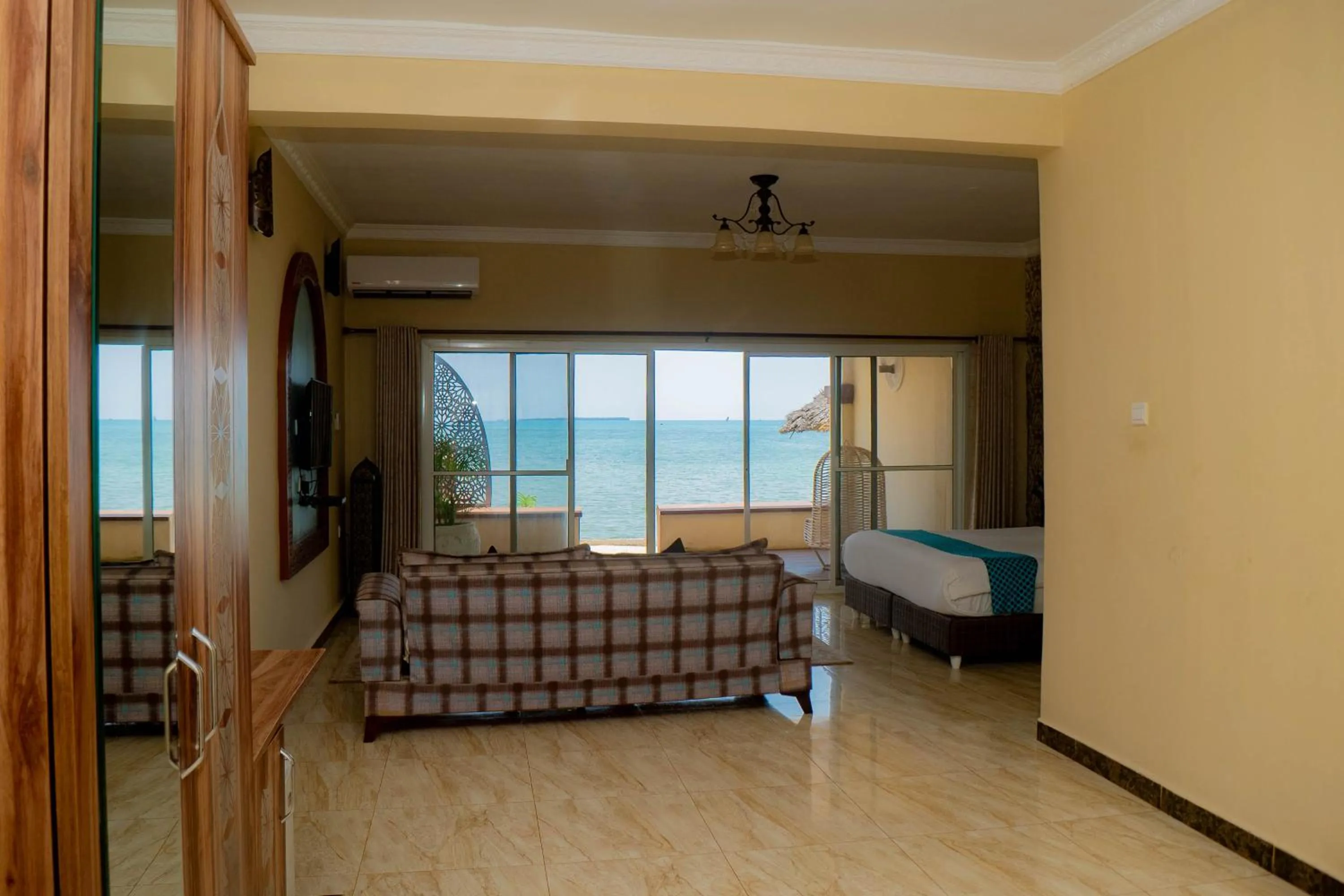 Bed in Golden Palm Boutique Zanzibar