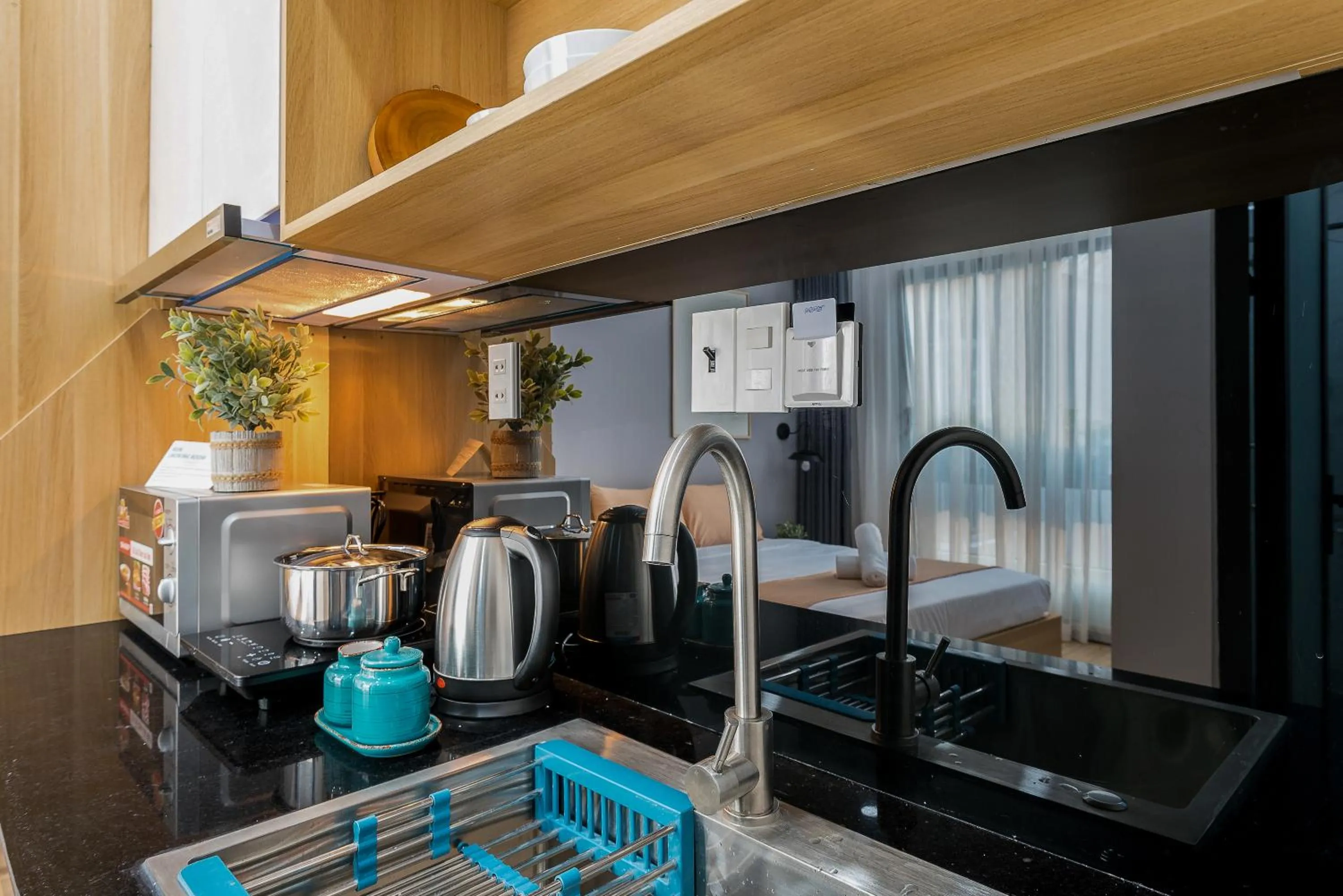 Kitchen or kitchenette in Cozrum Homes Ambera House