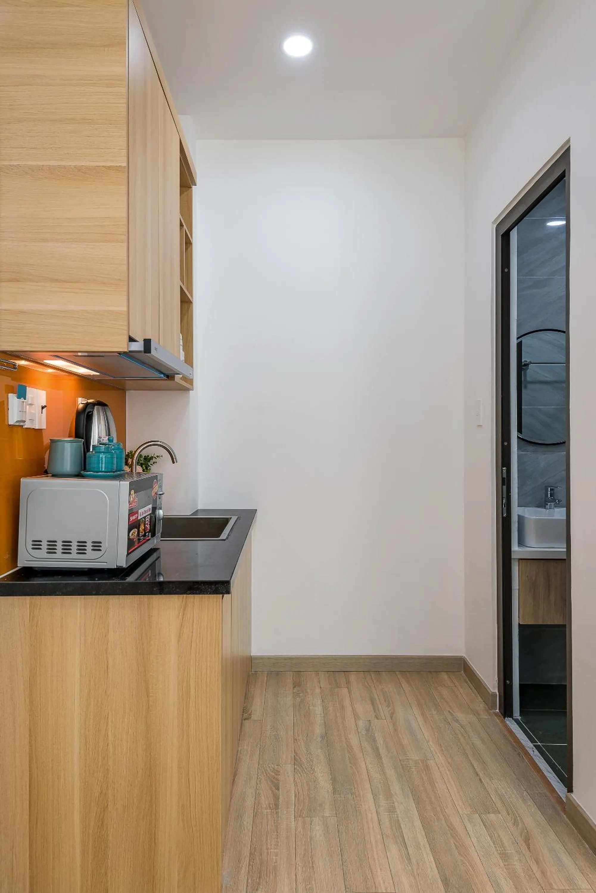 Kitchen or kitchenette in Cozrum Homes Ambera House