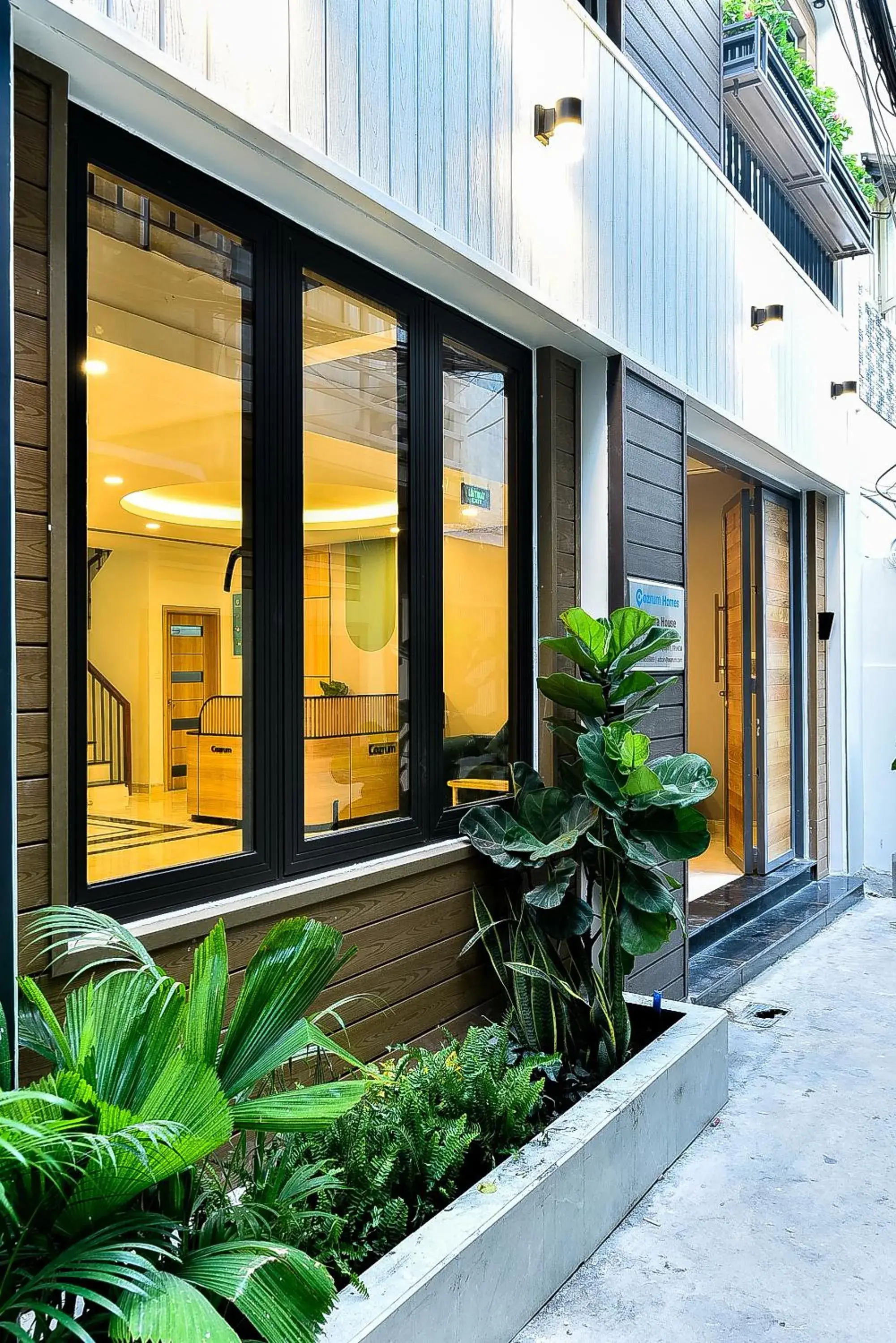 Facade/entrance in Cozrum Homes Ambera House Facade/entrance in Cozrum Homes Ambera House