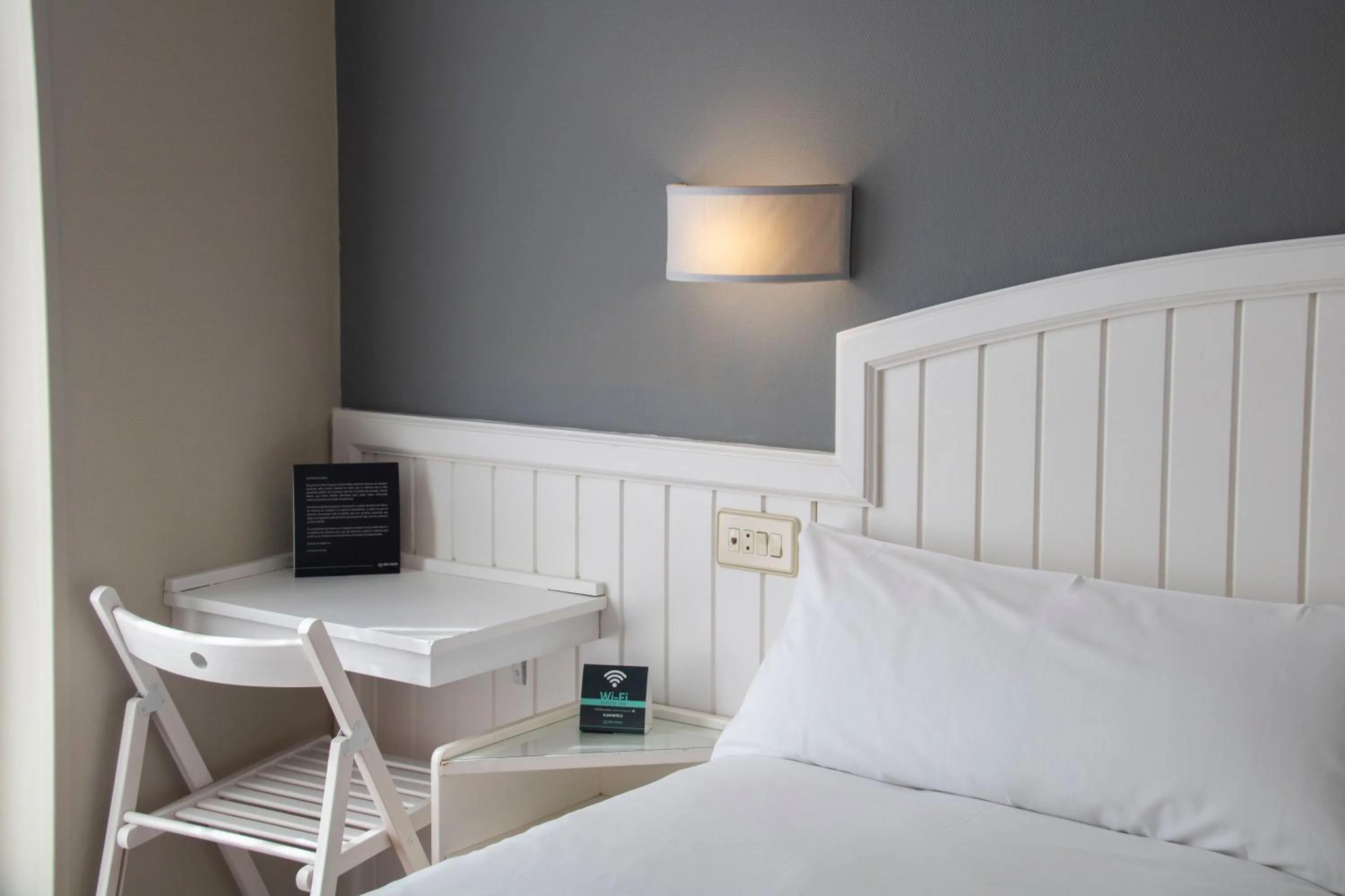 Bed in Alda Miramar Rooms