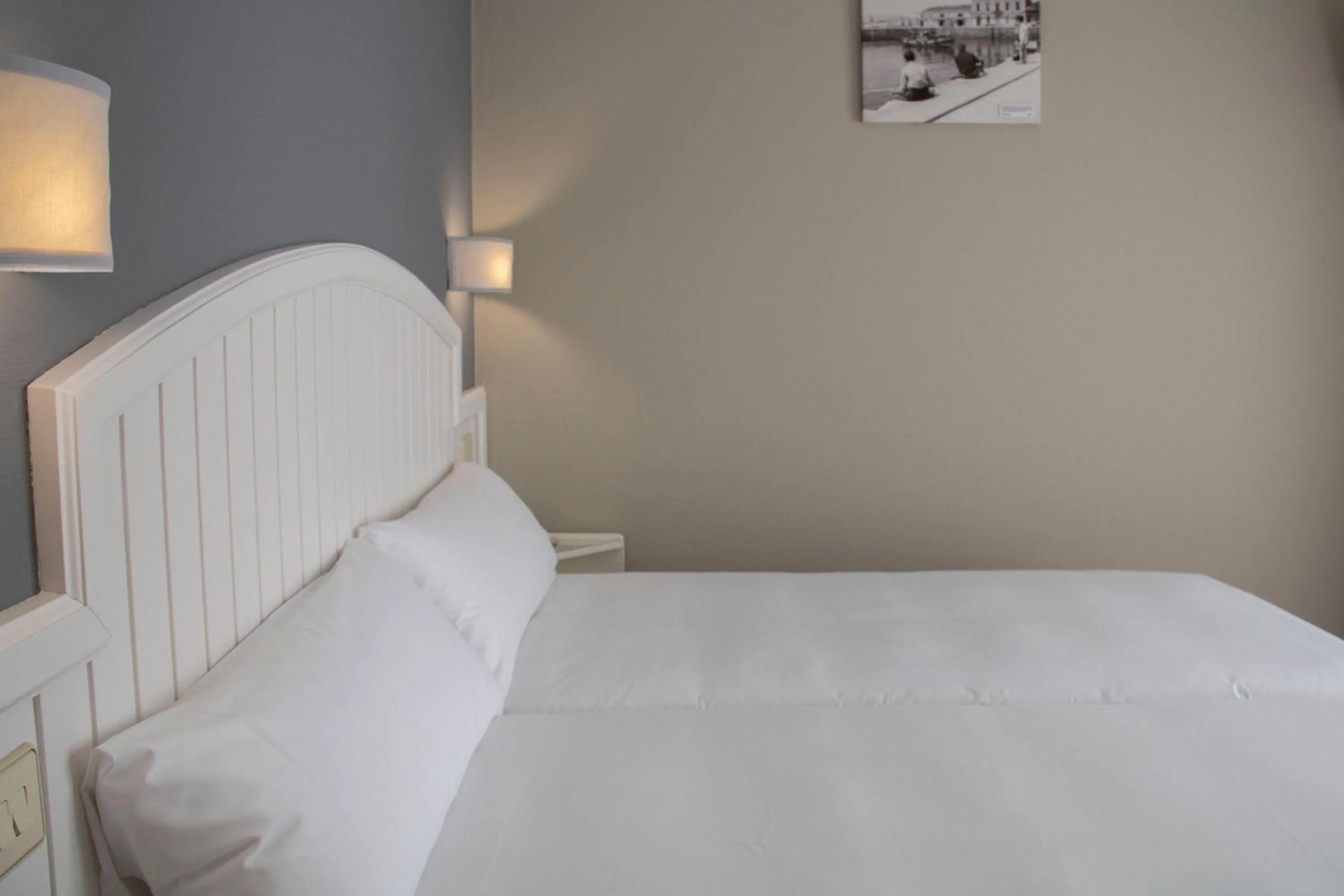 Bed in Alda Miramar Rooms