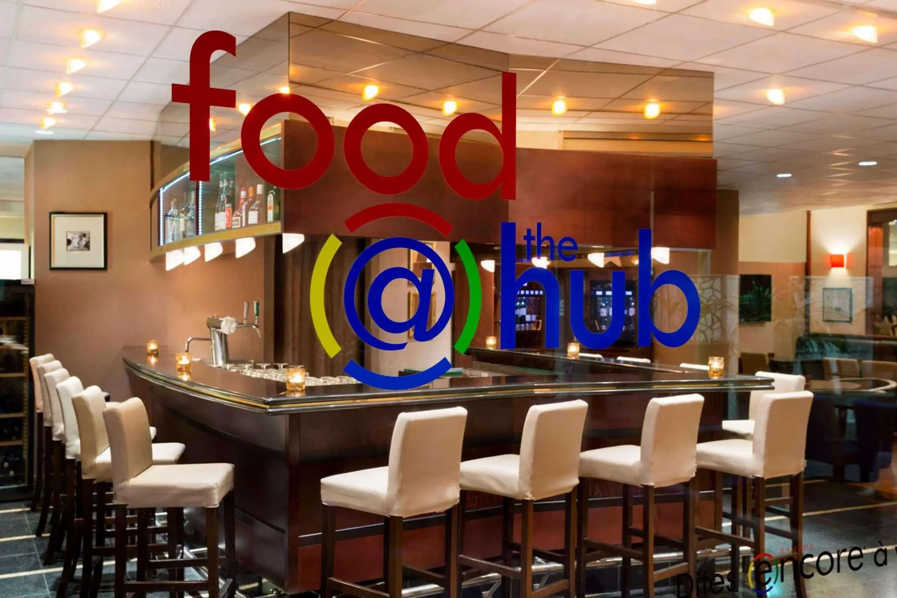 Lounge or bar in Ramada Encore by Wyndham Geneva Lounge or bar in Ramada Encore by Wyndham Geneva