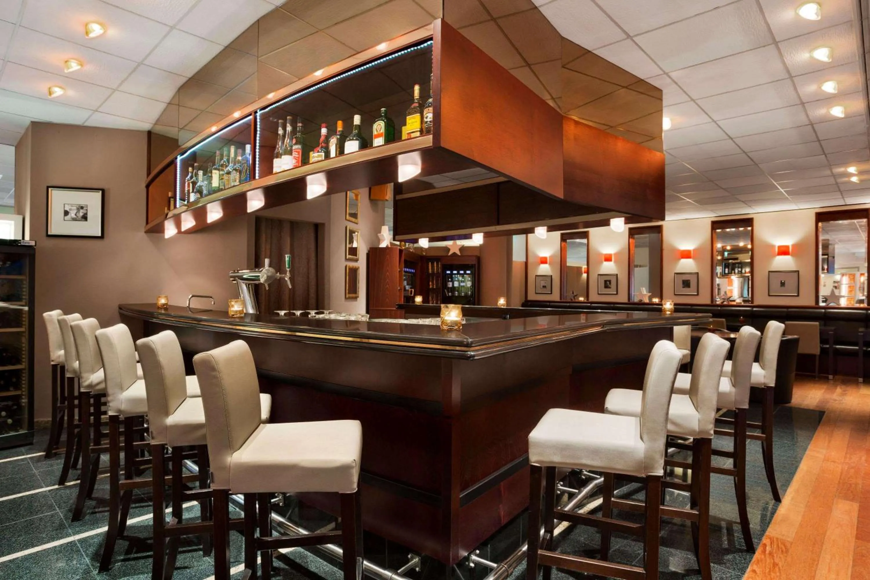 Lounge or bar in Ramada Encore by Wyndham Geneva