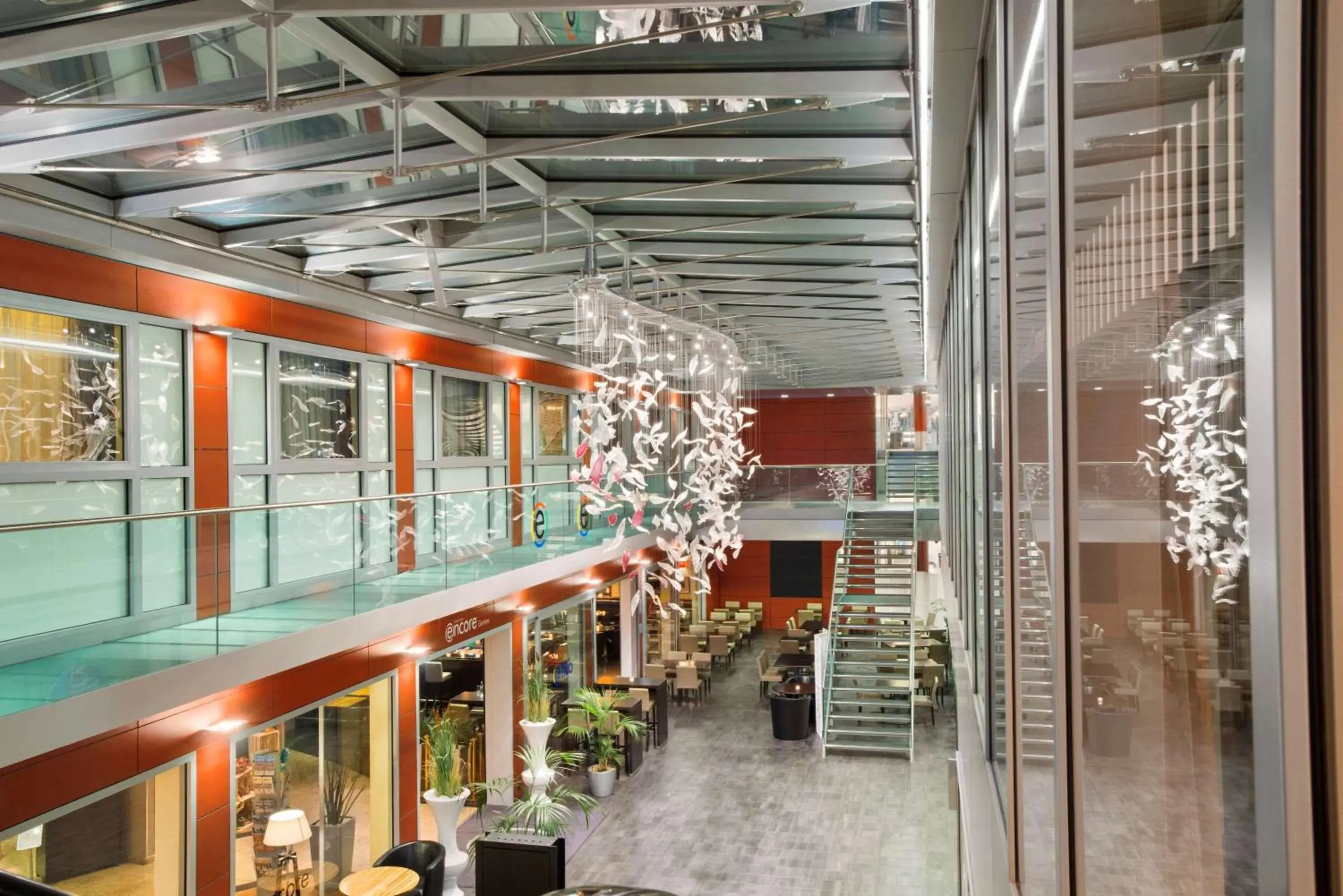 Lounge or bar in Ramada Encore by Wyndham Geneva Lounge or bar in Ramada Encore by Wyndham Geneva