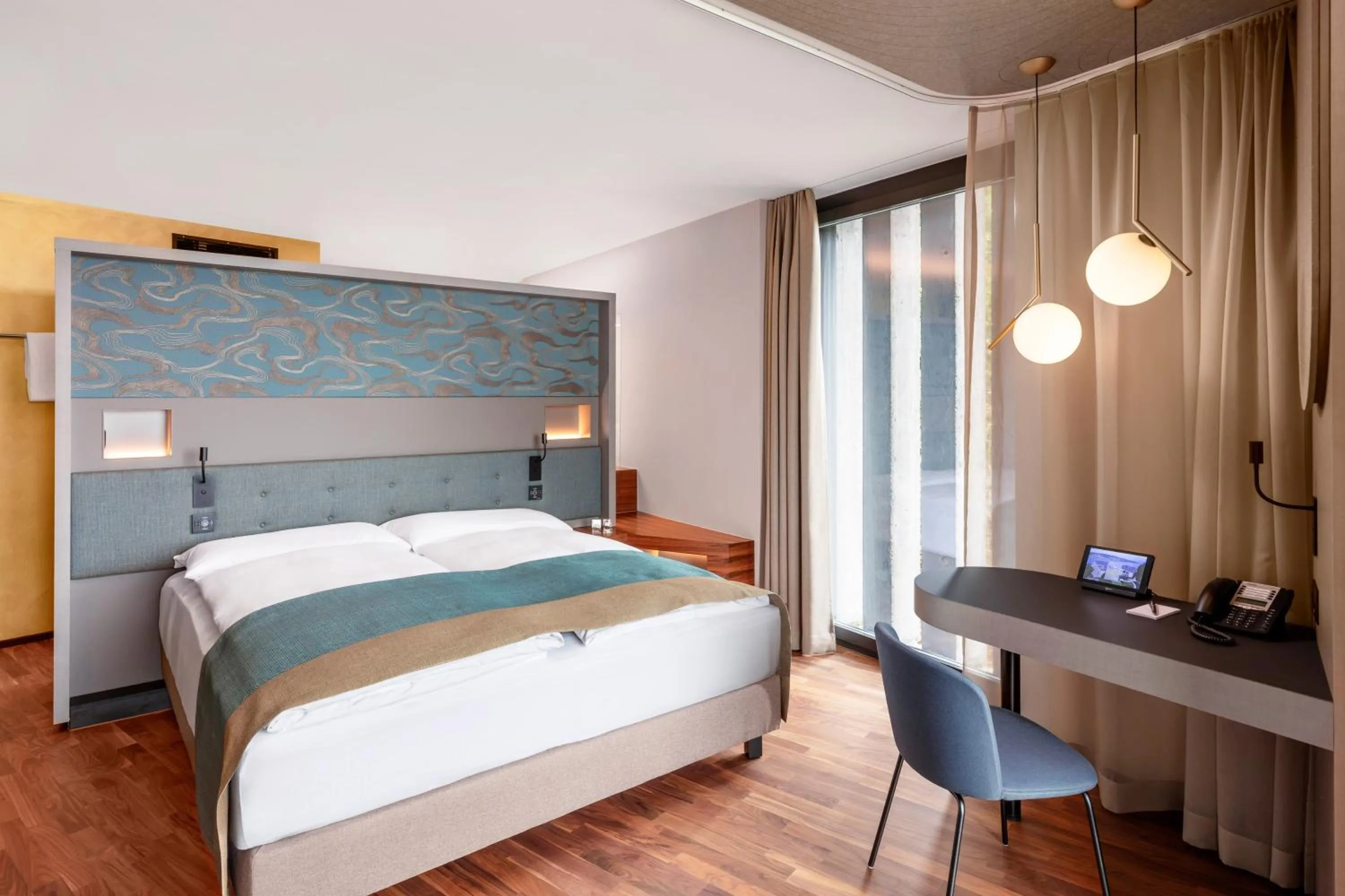 Bed in Hotel Belvoir Lake View & Spa