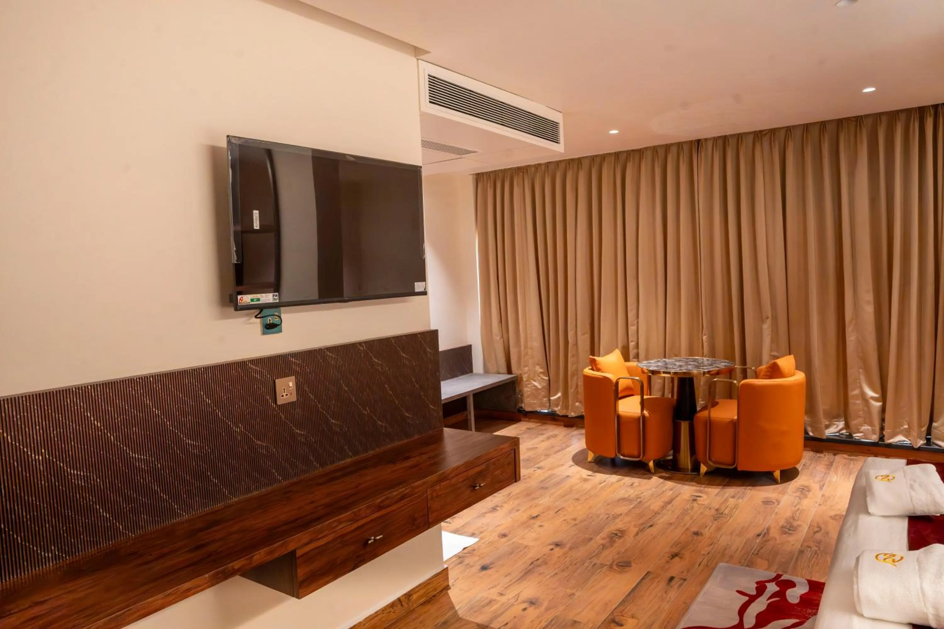 TV and multimedia in Hotel Golden Amulya Rest Wings