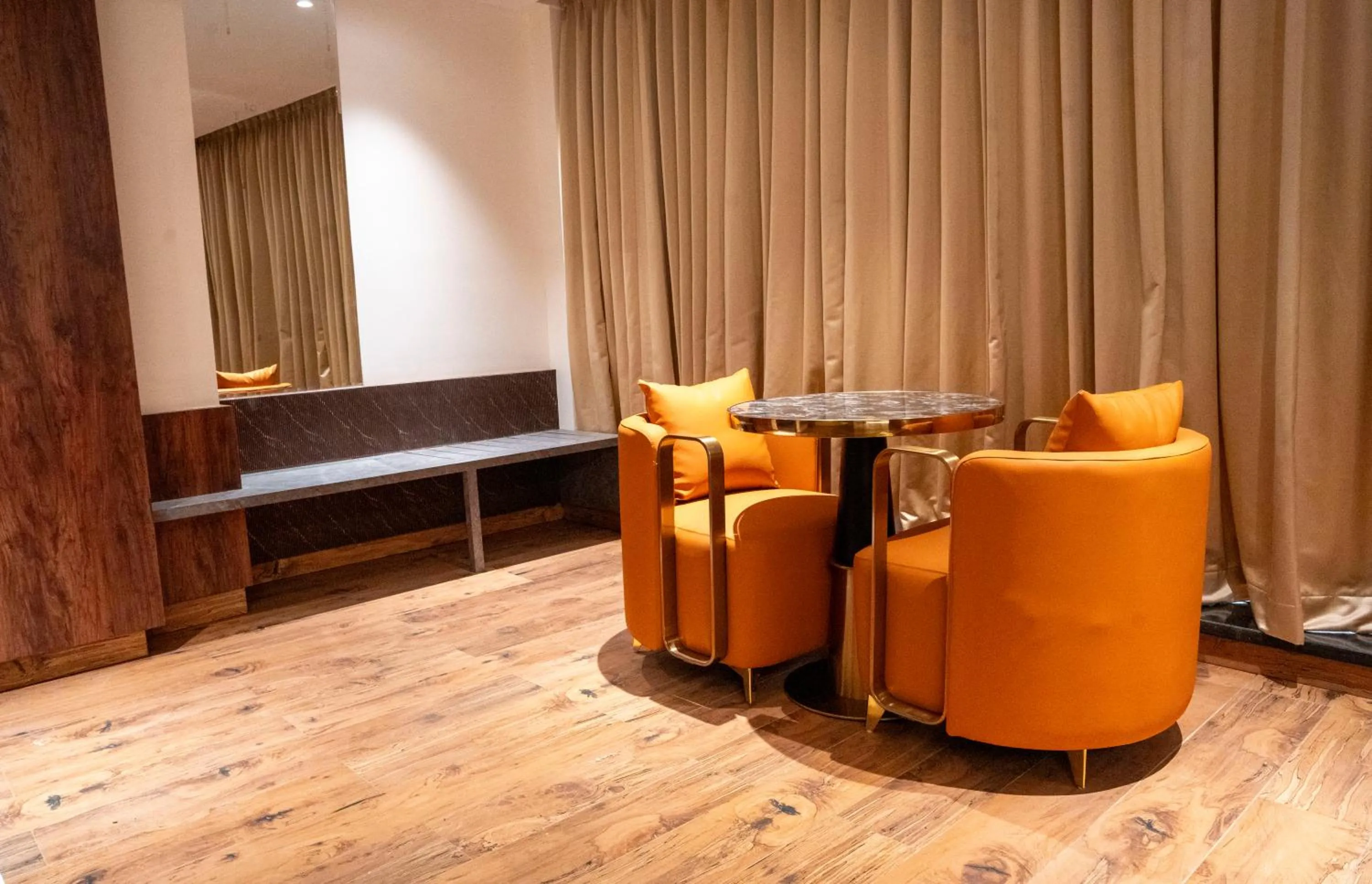 Living room in Hotel Golden Amulya Rest Wings