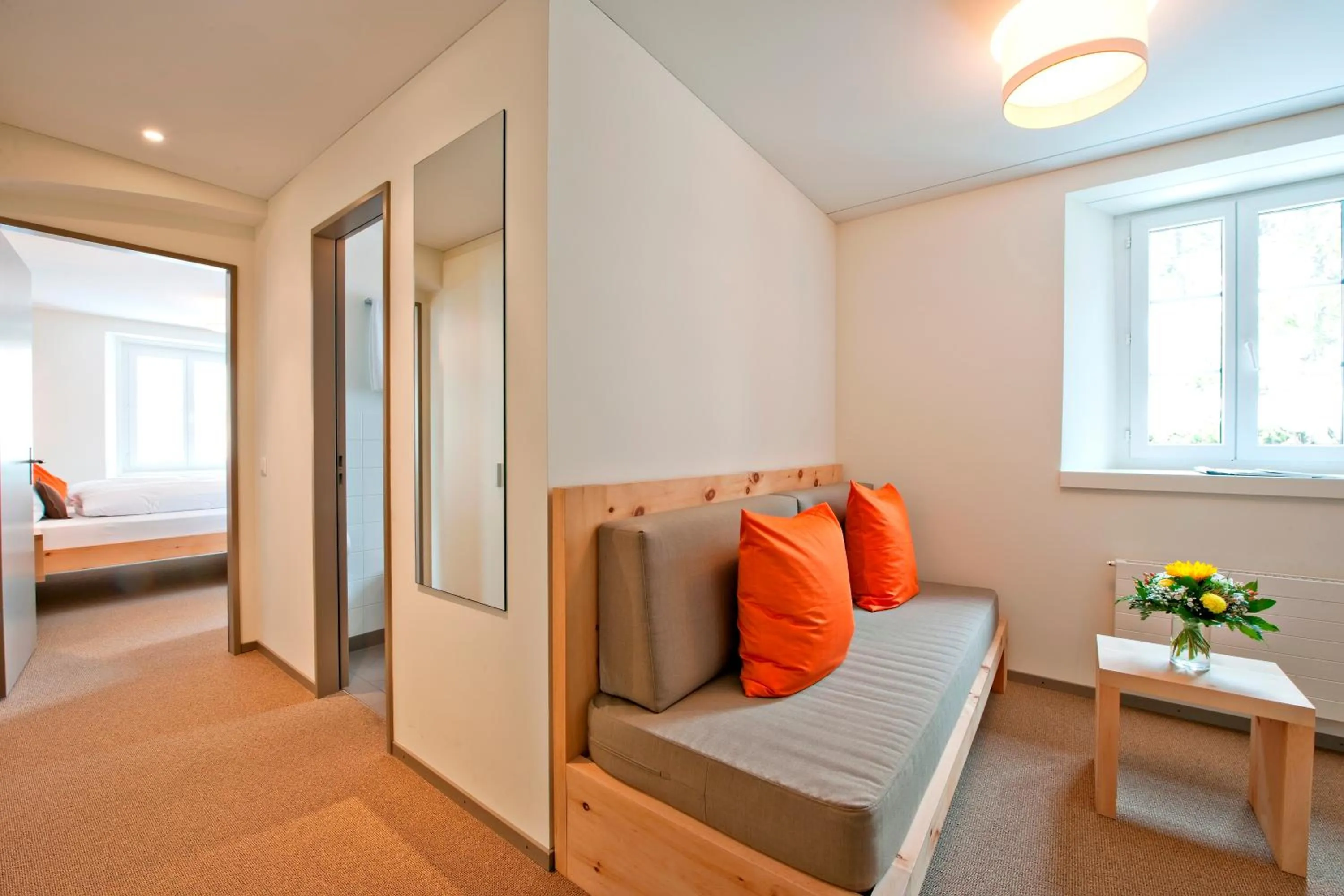 Seating area, Bed in Hotel Donatz