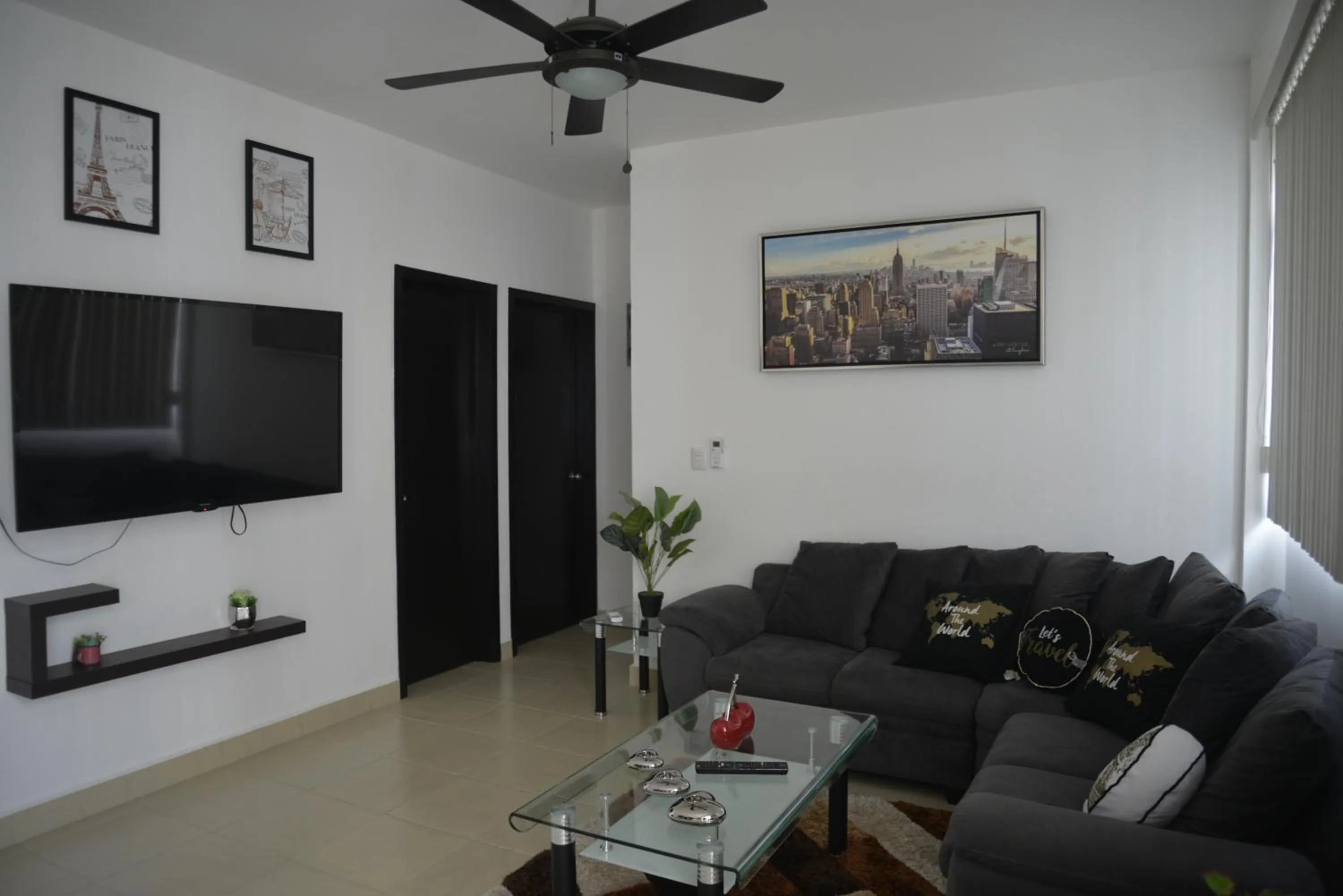 Living room in PLAYA SUITES apartment