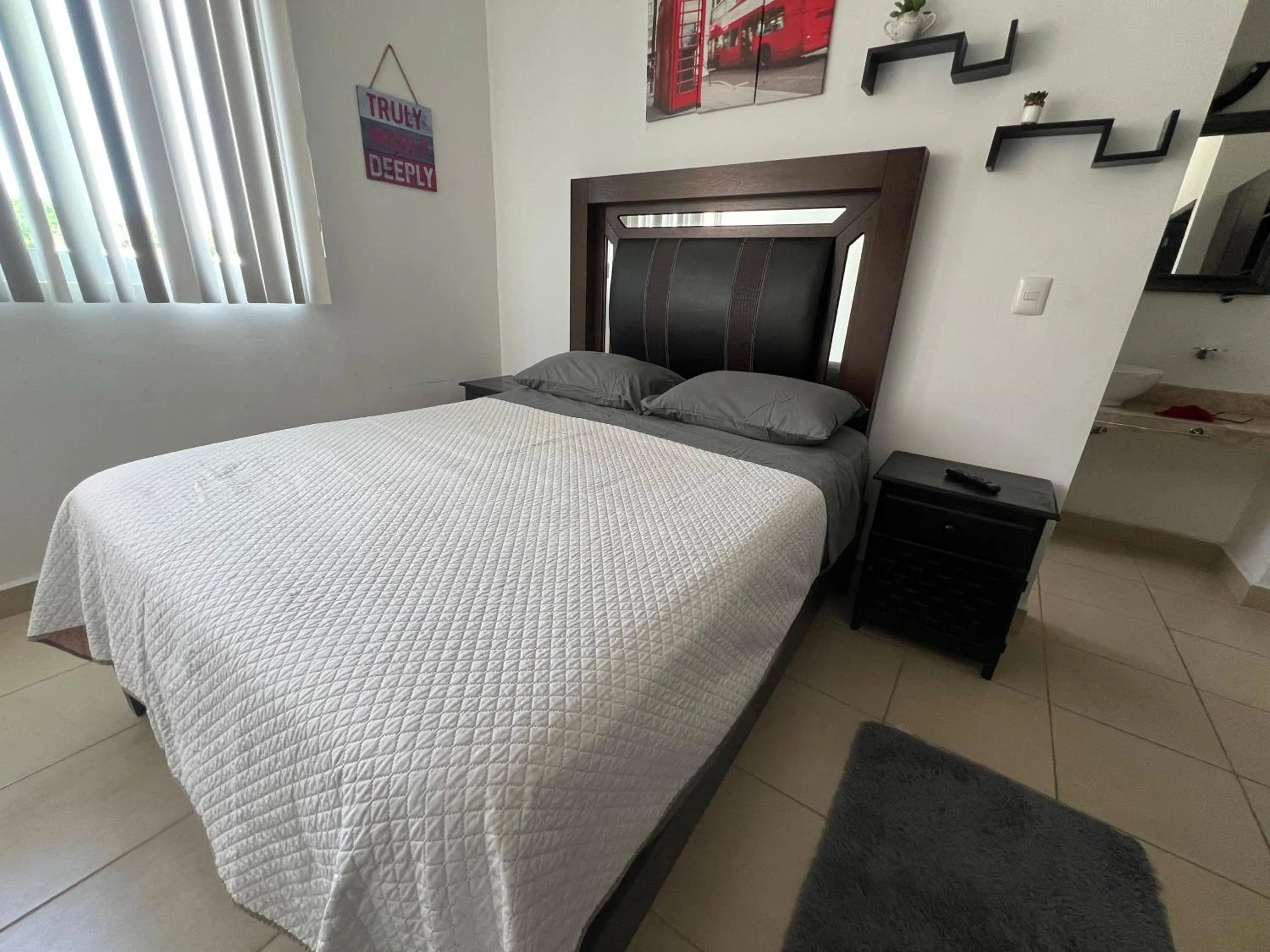 Bedroom, Bed in PLAYA SUITES apartment