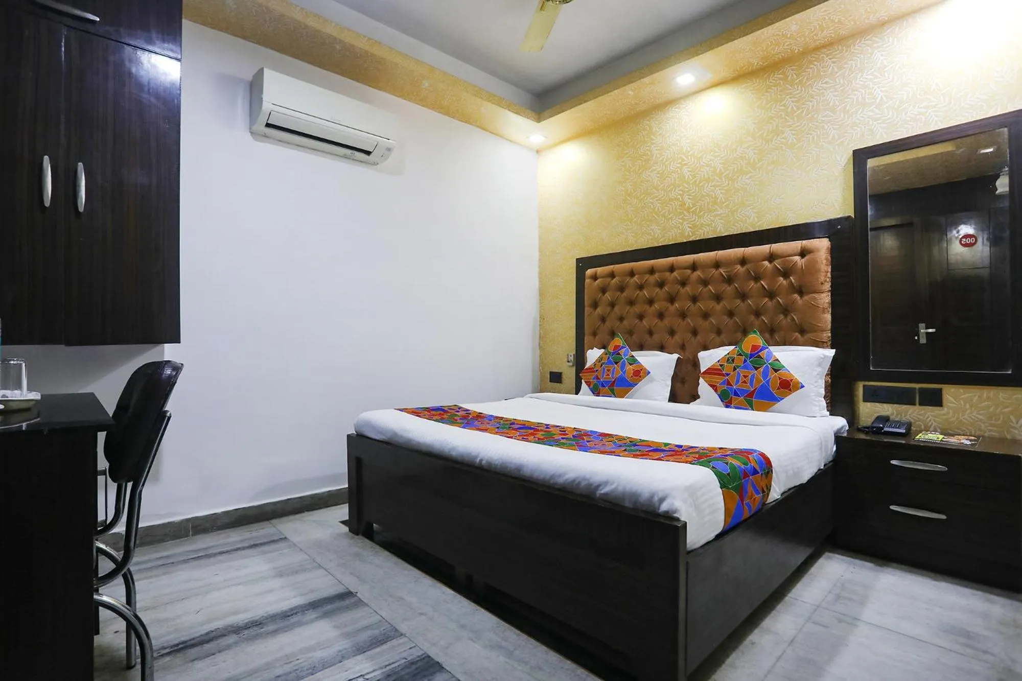 Bed in FabHotel NK Residency