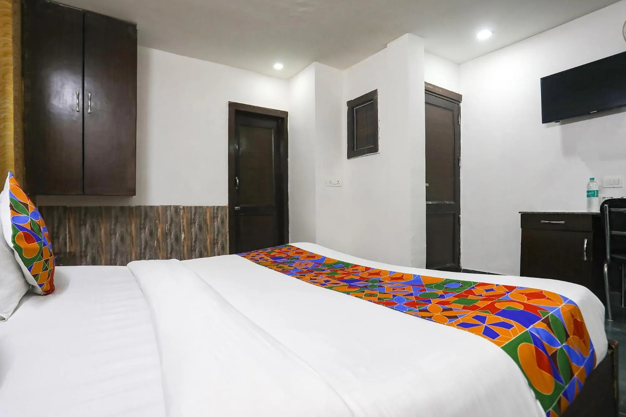 Bed in FabHotel NK Residency