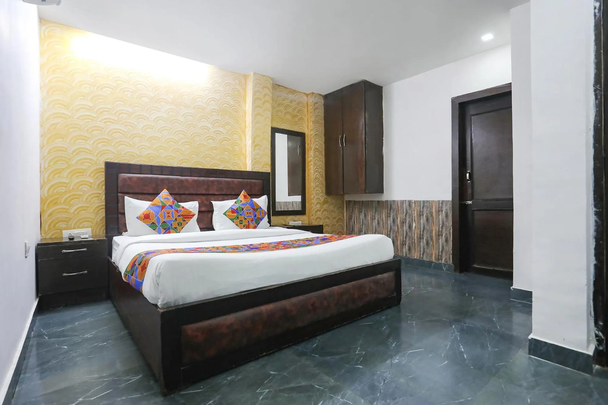 Bed in FabHotel NK Residency