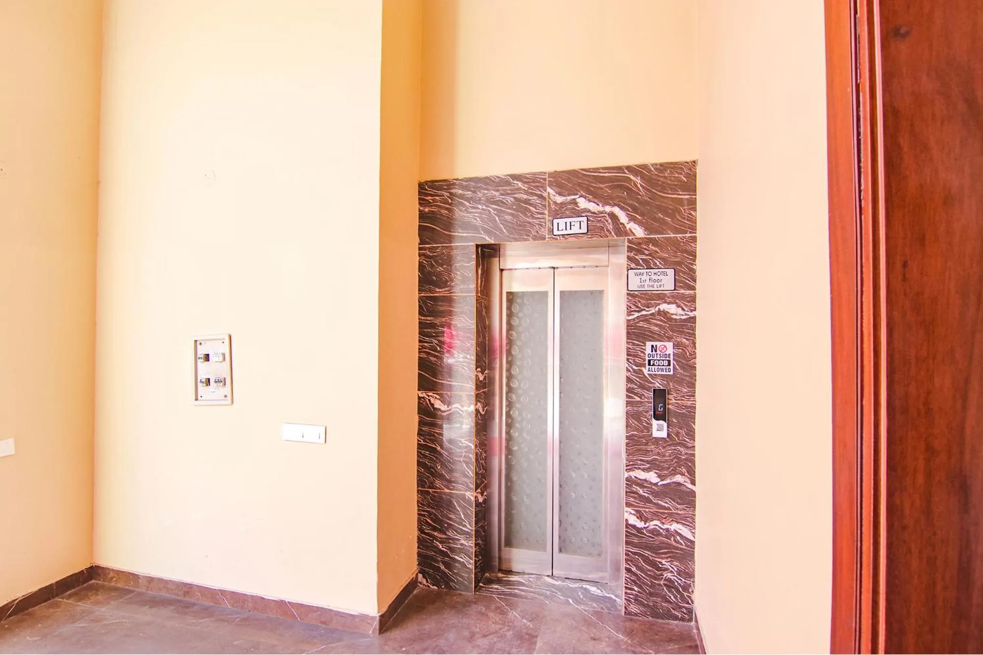 elevator in FabHotel Royal Mapple