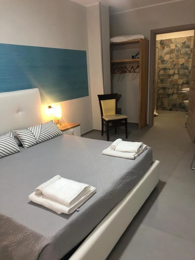 Photo of the whole room, Bed in Albergo Piazza Risorgimento
