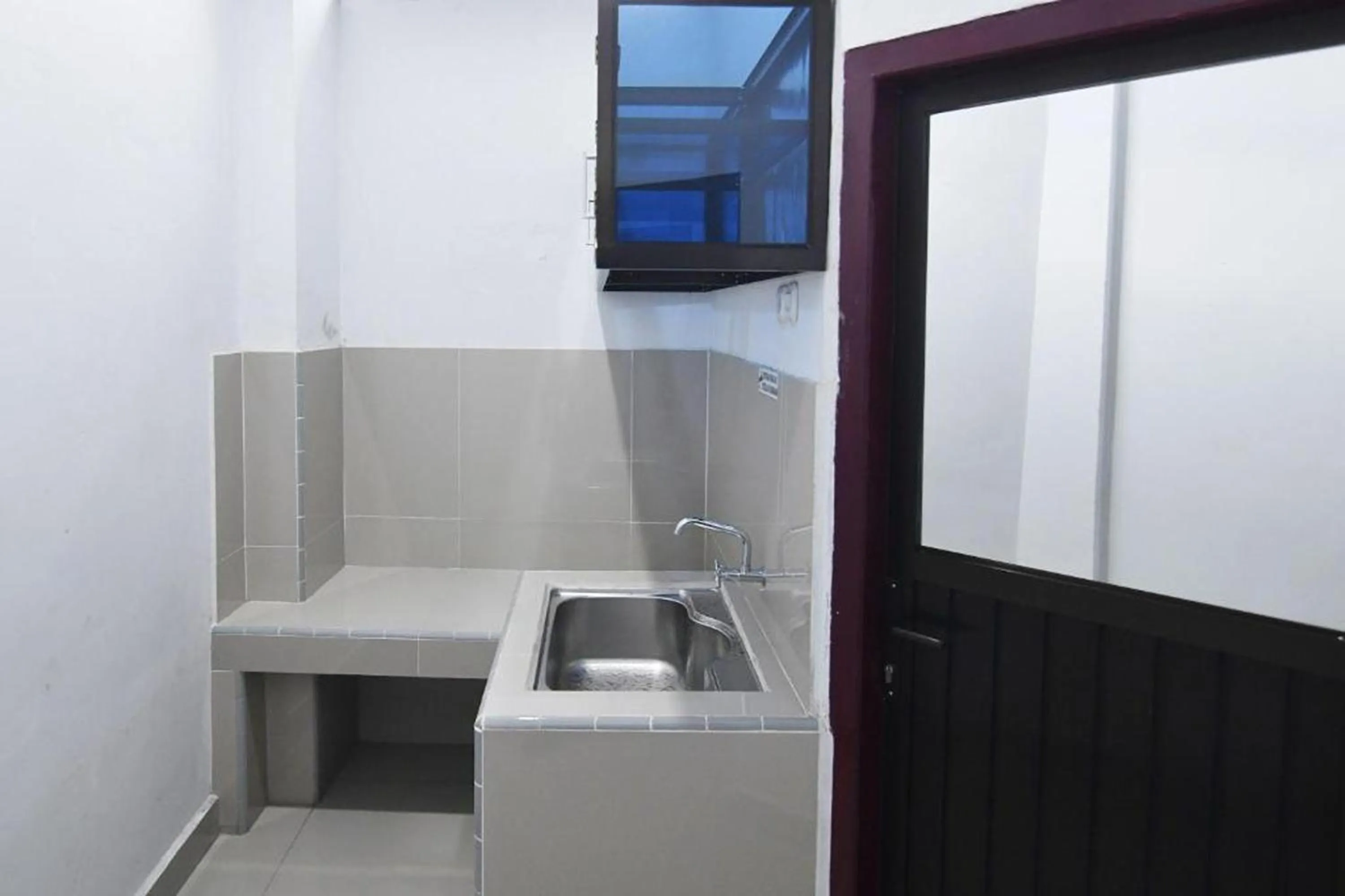 Kitchen or kitchenette in Rich Guesthouse