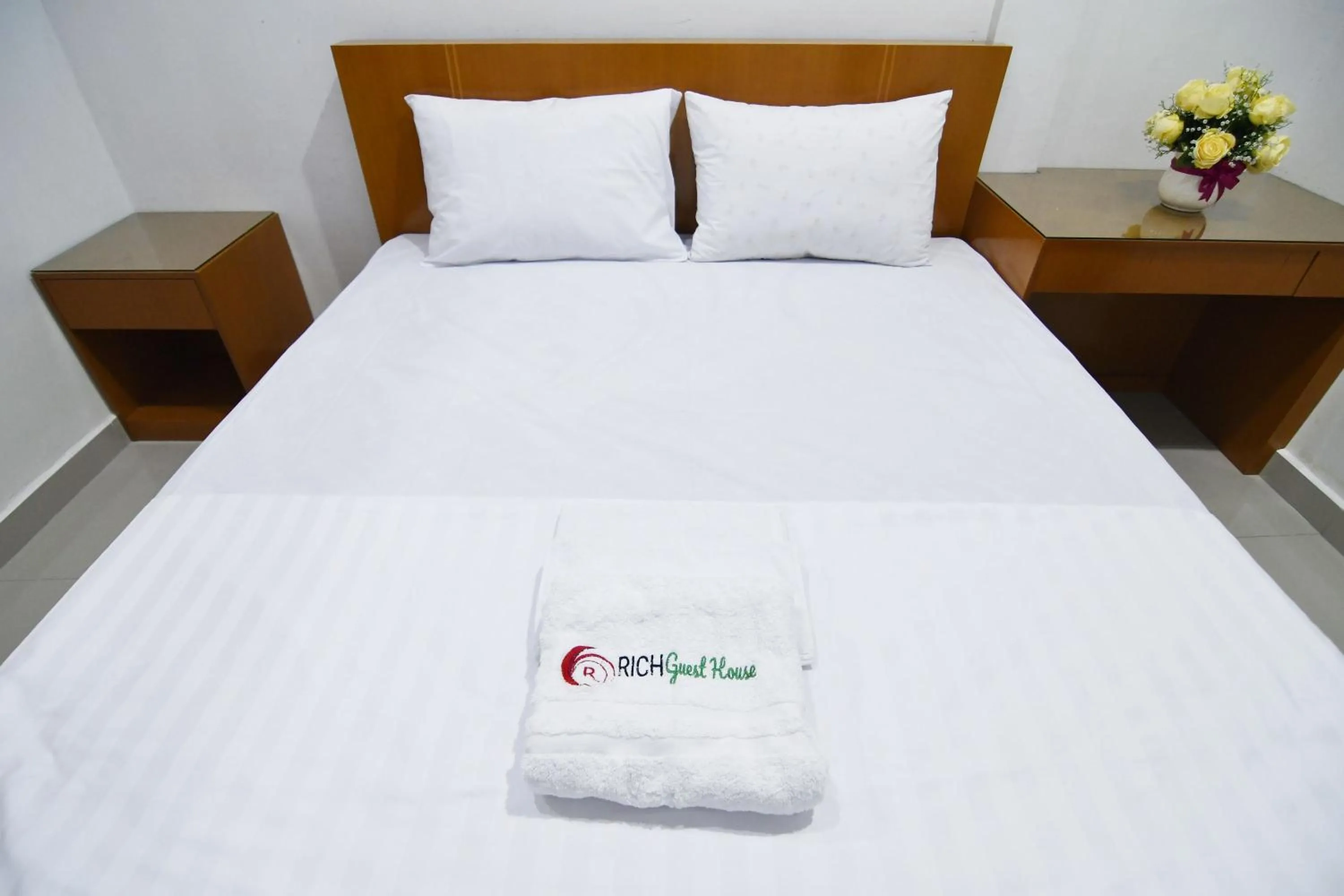 Bed in Rich Guesthouse