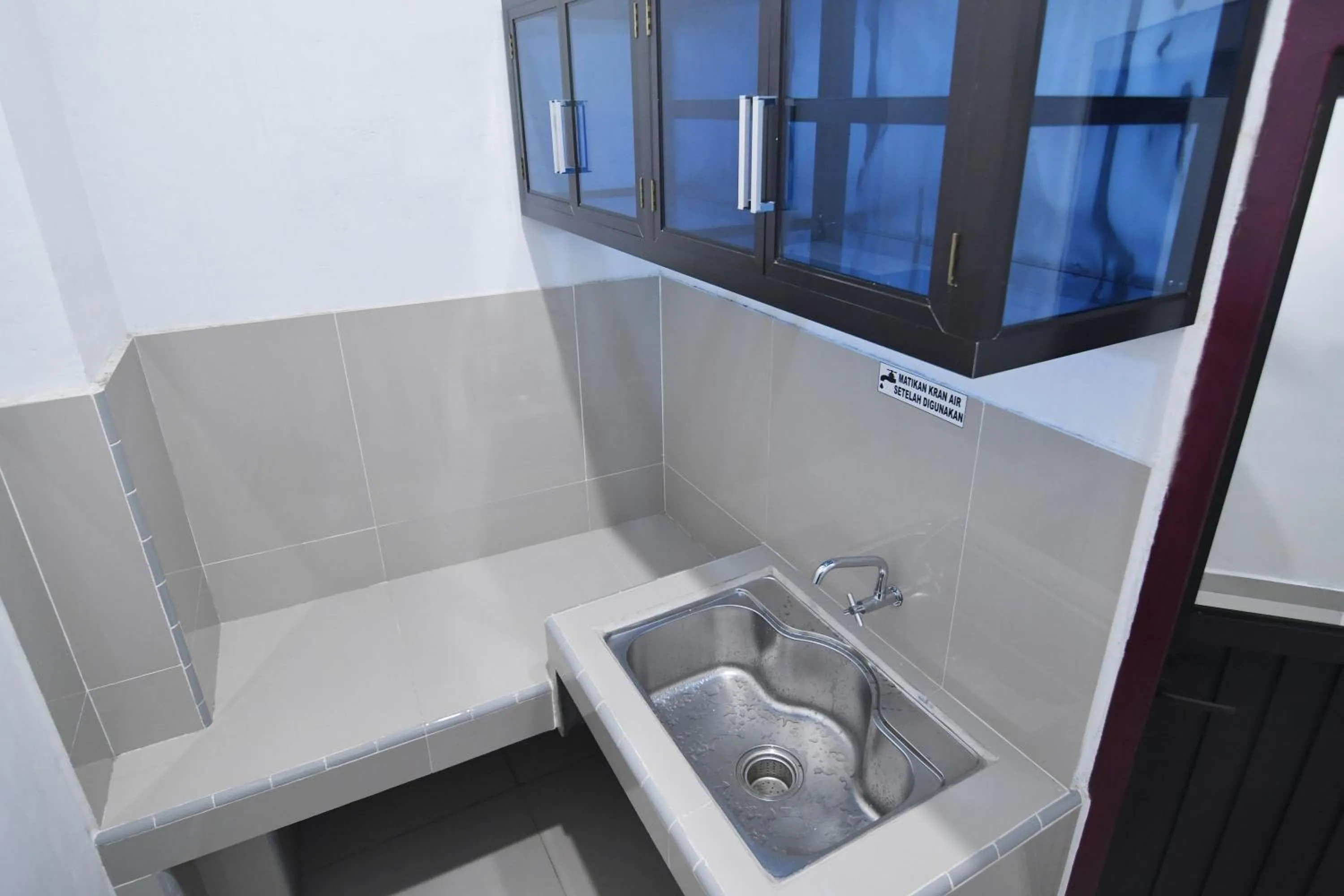 Kitchen or kitchenette in Rich Guesthouse