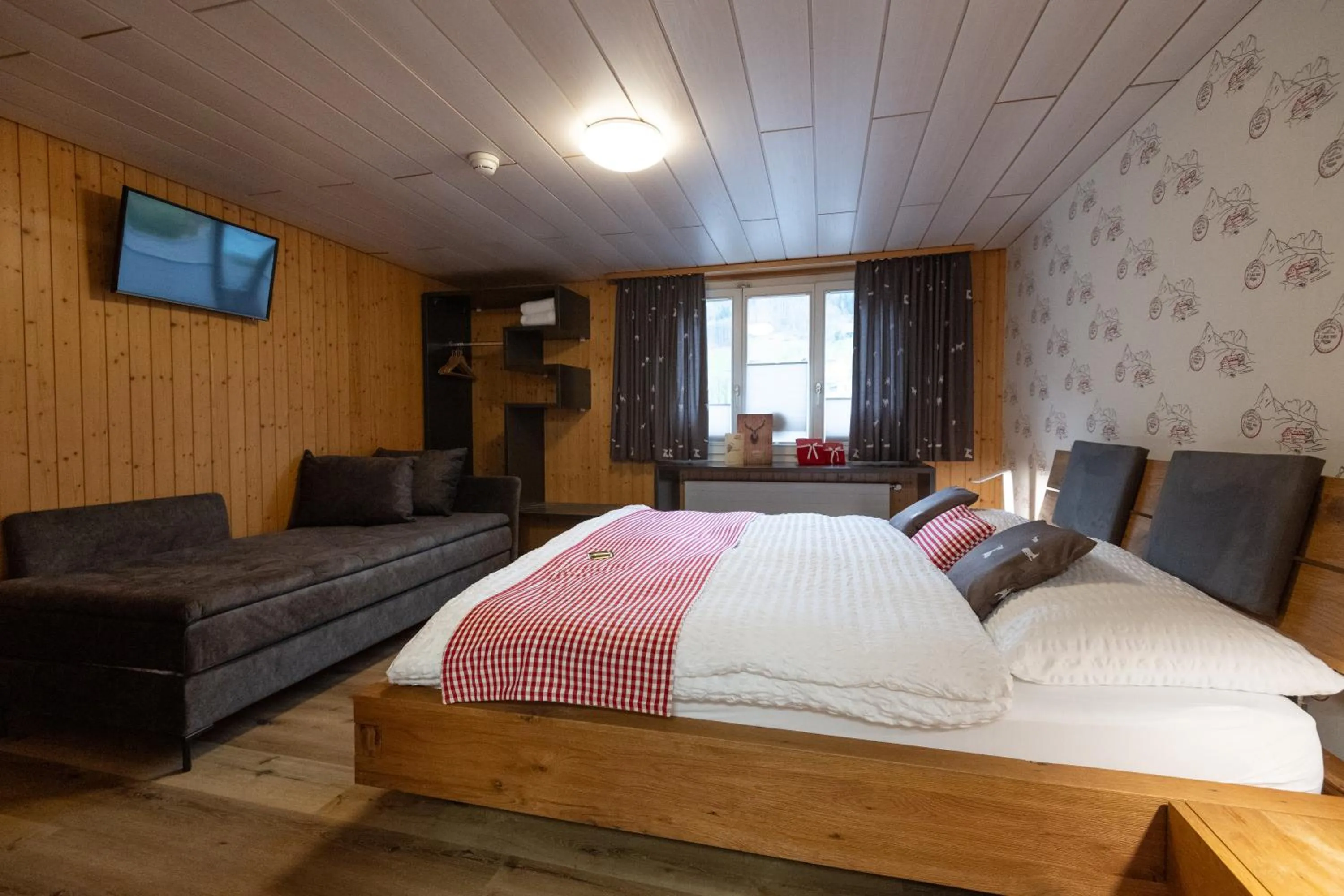 Photo of the whole room, Bed in Hotel Roggerli