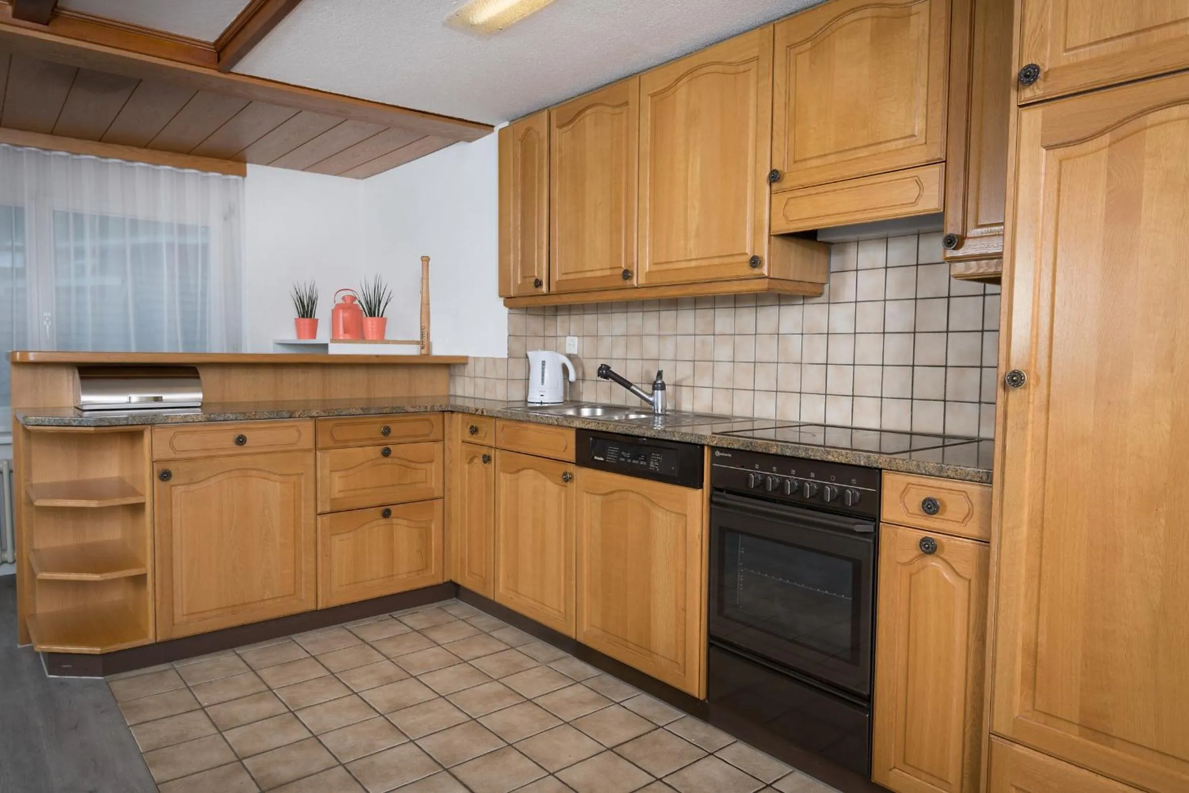 Kitchen or kitchenette in Hotel Roggerli