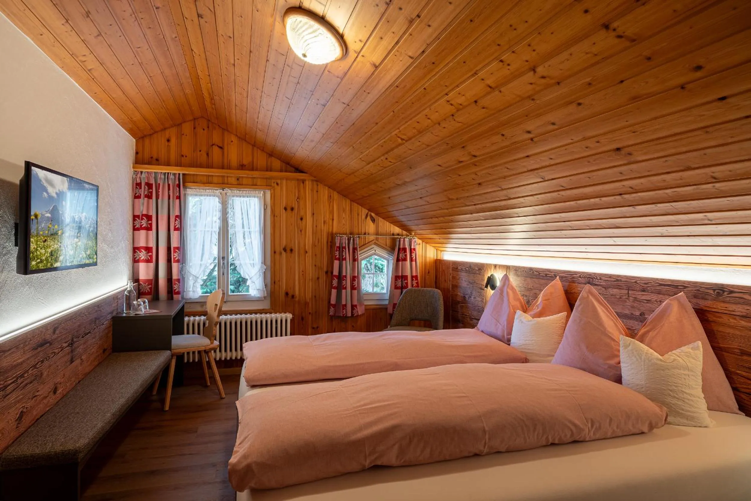 Photo of the whole room, Bed in Alpenblick Hotel & Restaurant Wilderswil by Interlaken