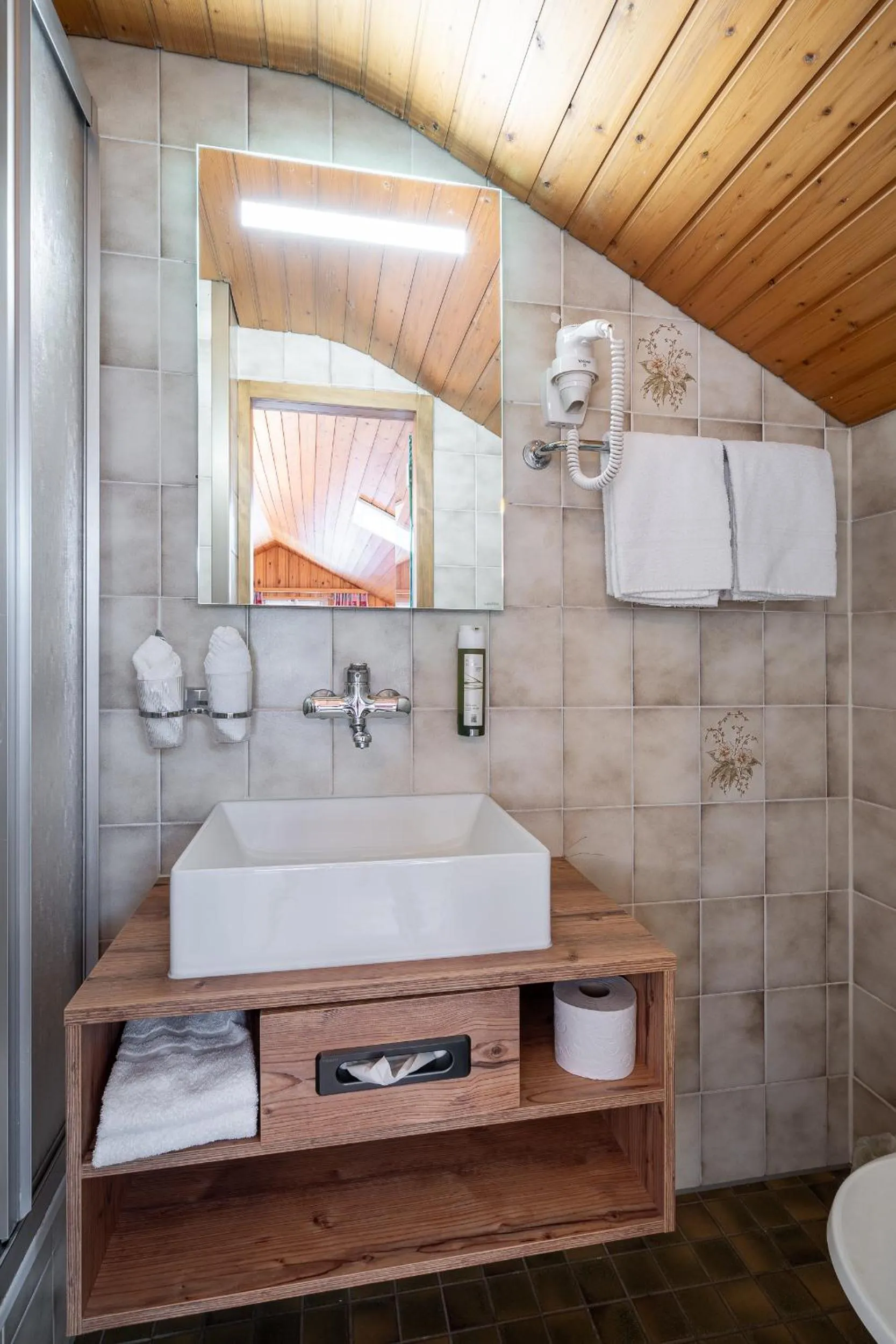 Bathroom in Alpenblick Hotel & Restaurant Wilderswil by Interlaken