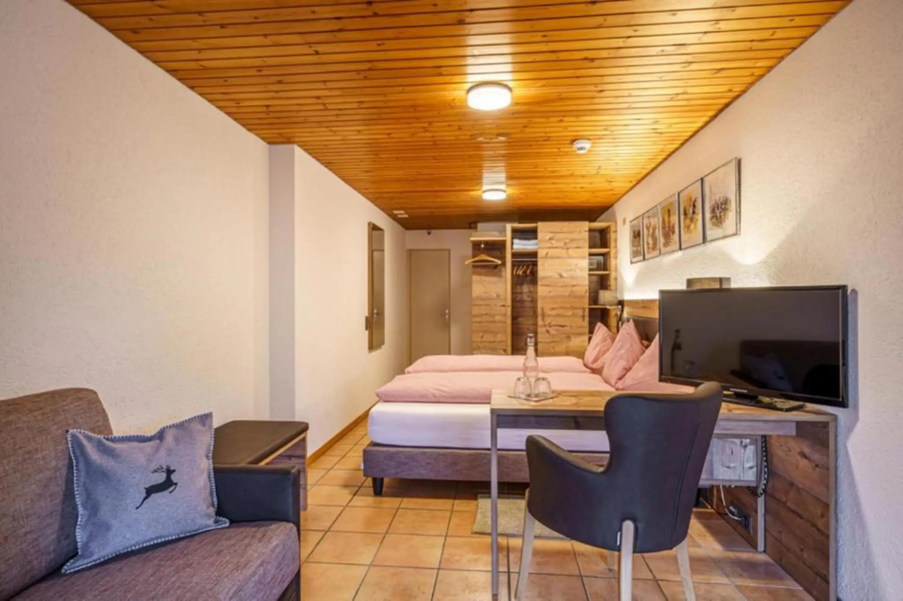 Bedroom, Bed in Alpenblick Hotel & Restaurant Wilderswil by Interlaken Bedroom, Bed in Alpenblick Hotel & Restaurant Wilderswil by Interlaken