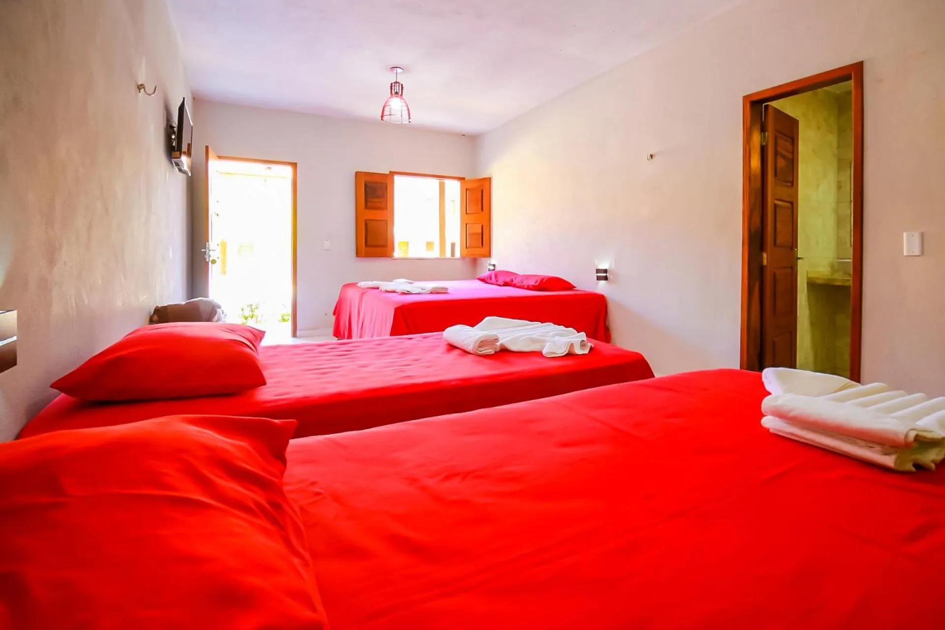 Bed in Pousada Recanto Beach