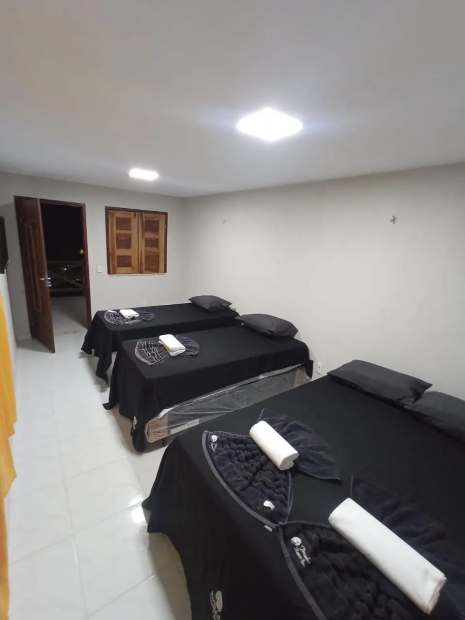 Bed in Pousada Recanto Beach