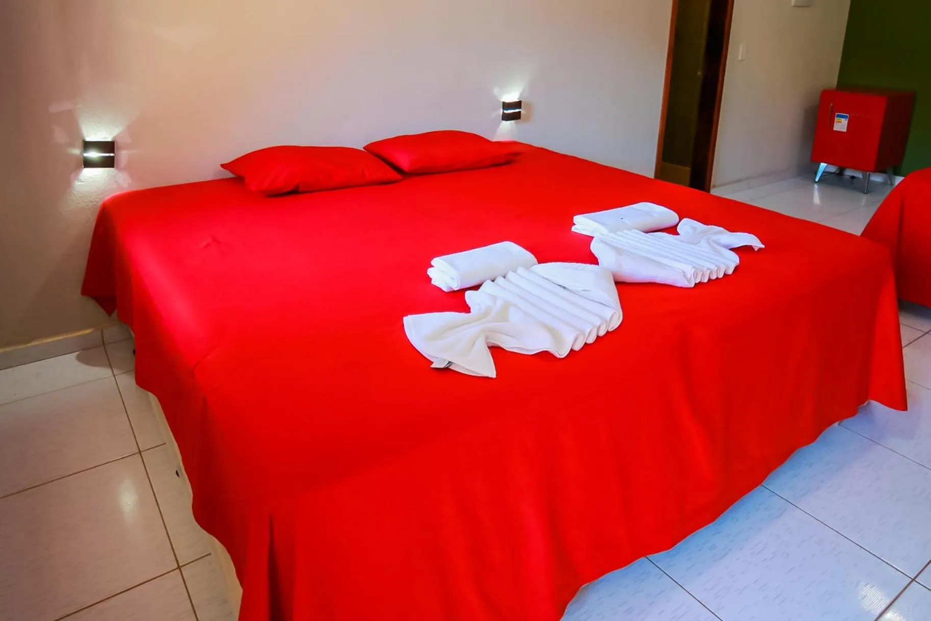 Bed in Pousada Recanto Beach