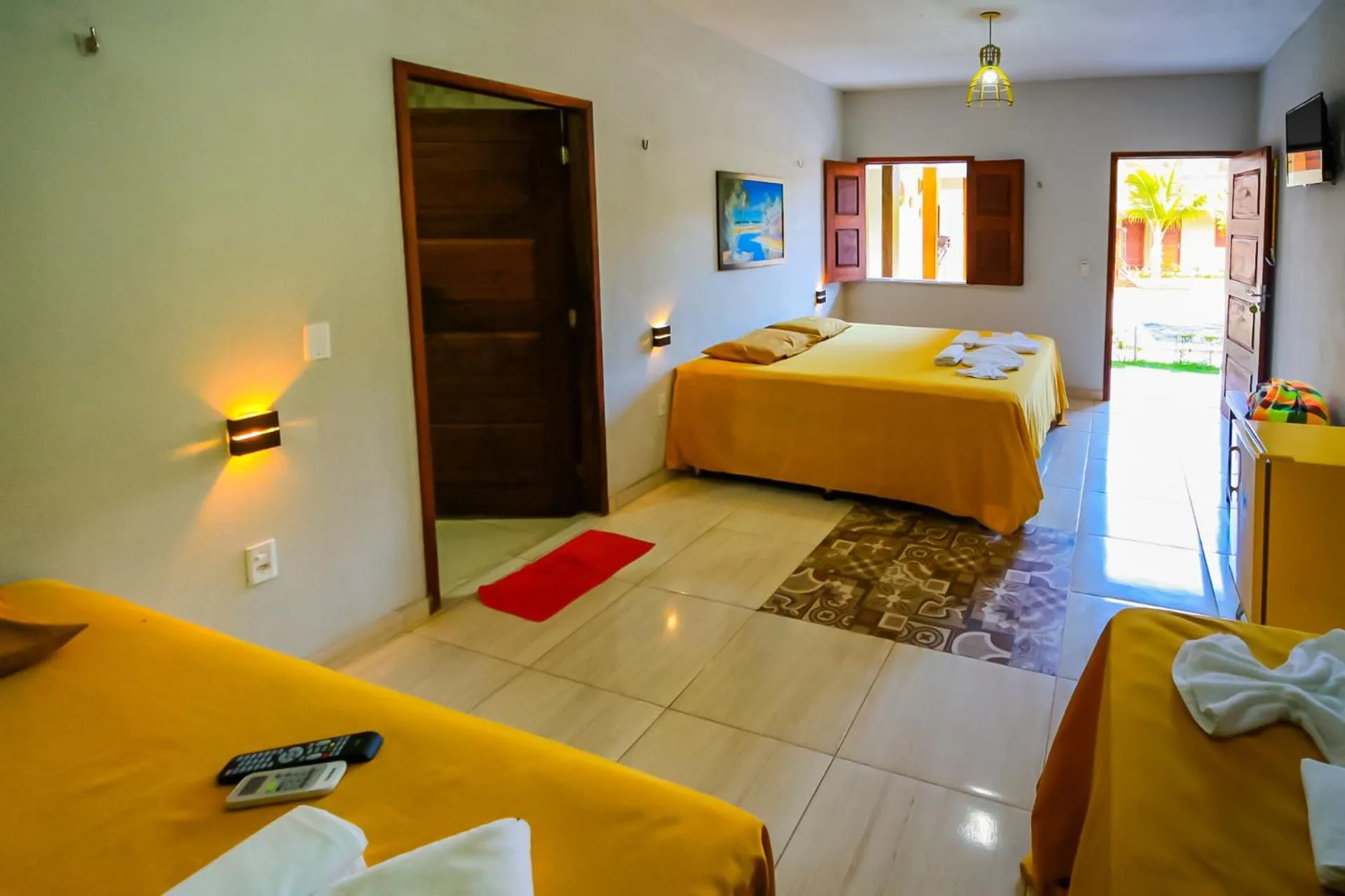 Bed in Pousada Recanto Beach