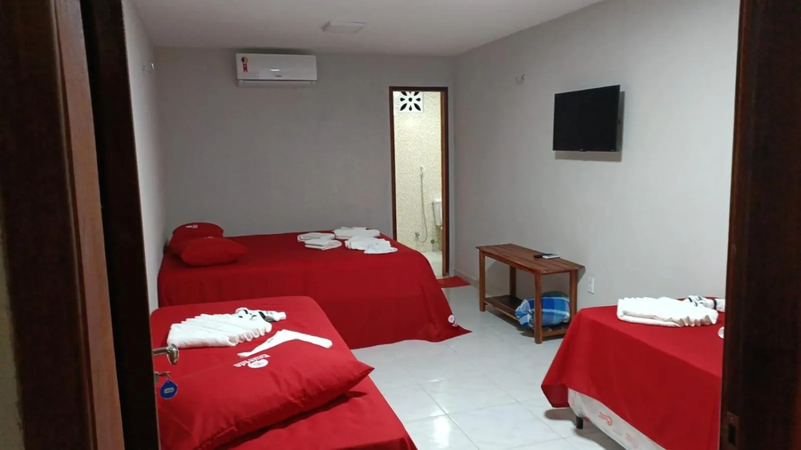 Bed in Pousada Recanto Beach