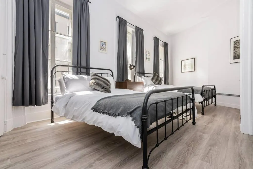 Bed in North House - Manoir des Remparts- Renovated 3 Bedroom Oasis