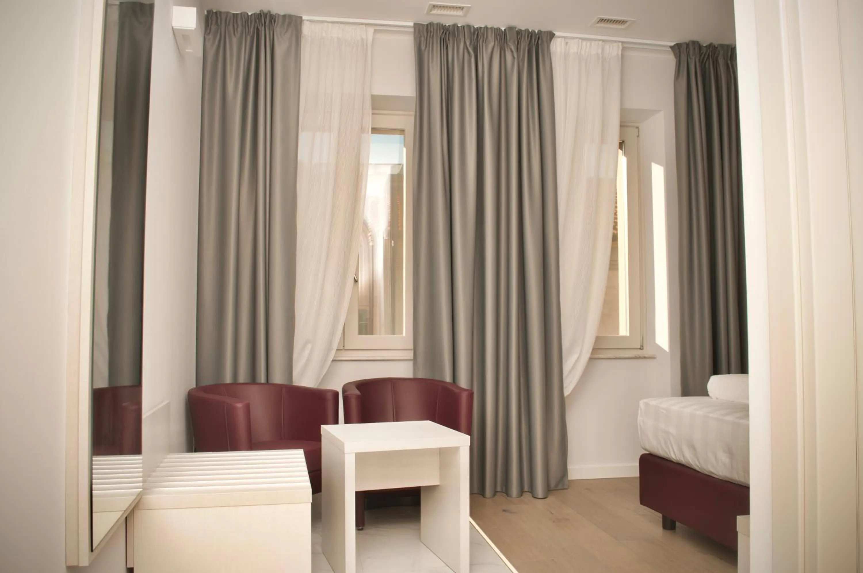 Seating area, Bed in Hotel Boutique Castiglione del Lago