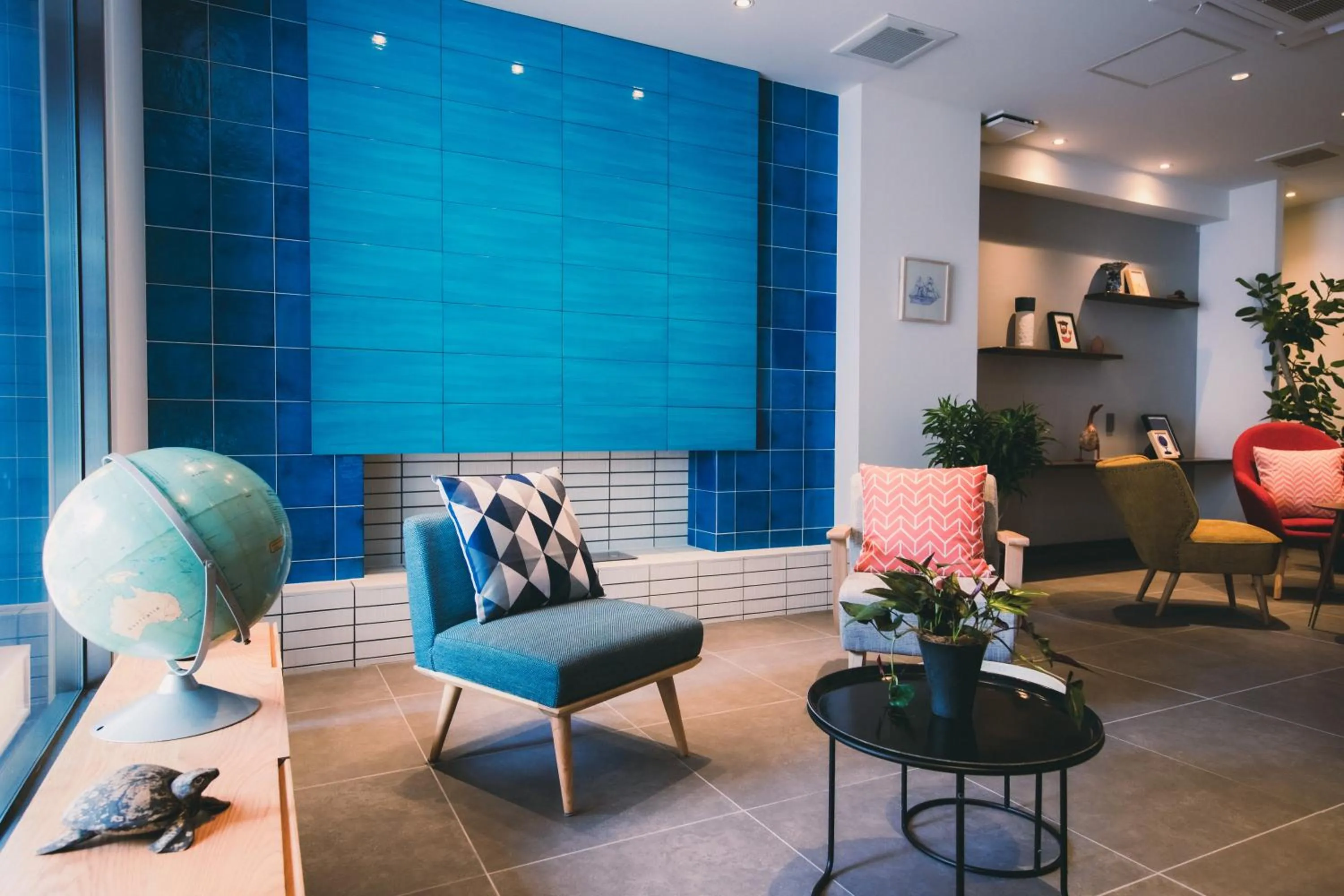 Communal lounge/ TV room in NAGI Hiroshima Hotel and Lounge