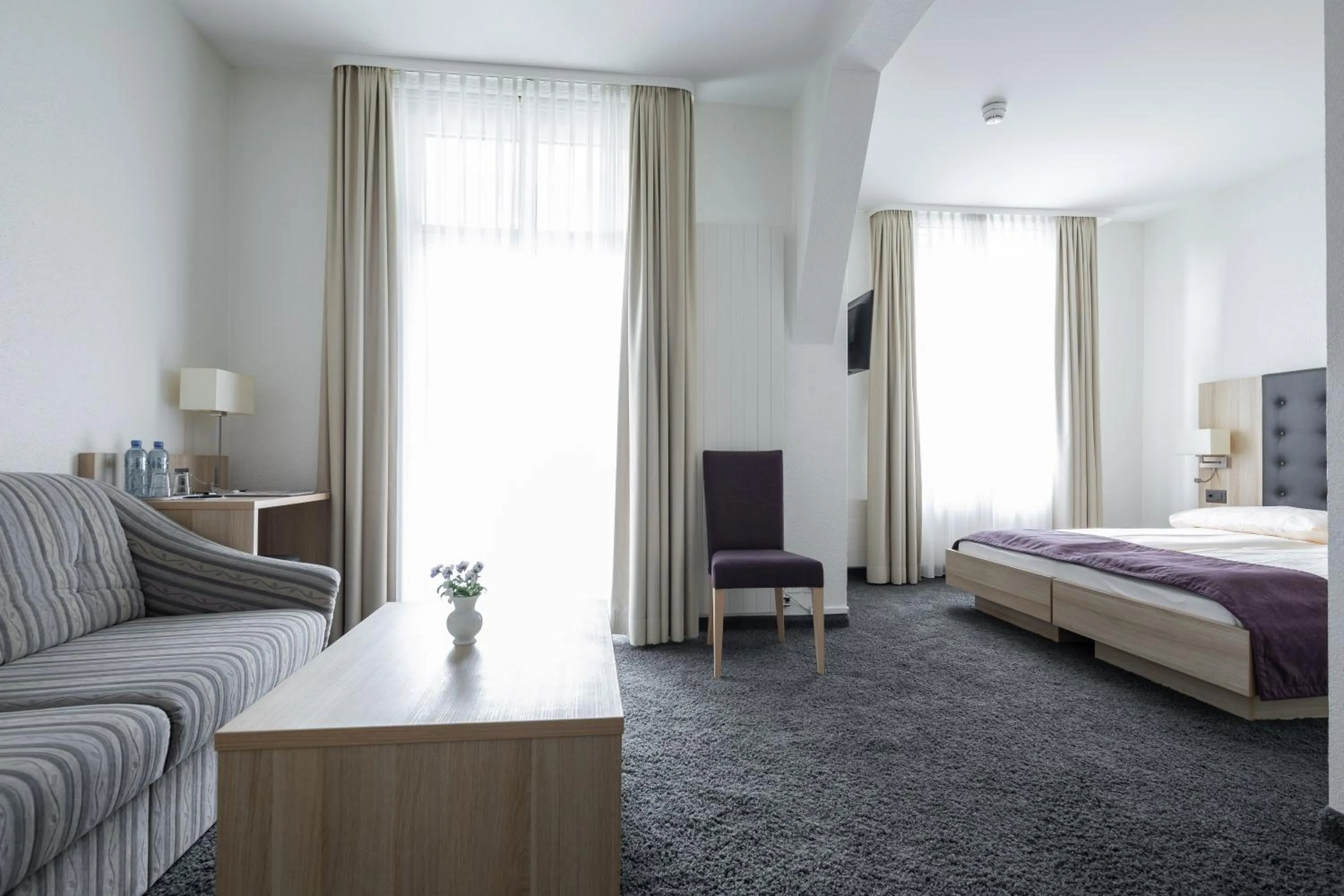 Photo of the whole room, Bed in Hotel Lötschberg